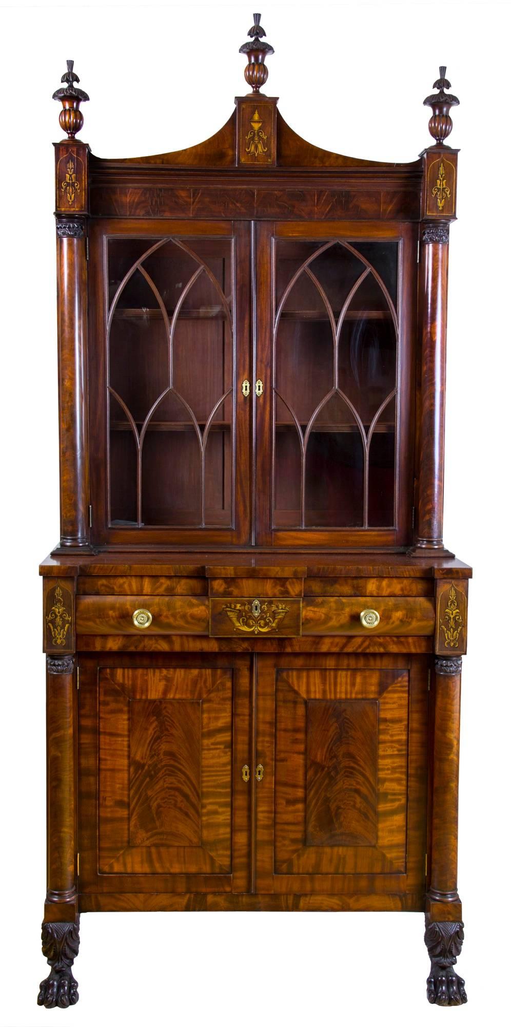 This is a magnificent and stately classical secretary which relates to a small grouping of elite cabinetmakers located in what is now Downtown Manhattan. Here Edward Holmes formed a partnership with Simeon Haines in 1825 and was a competitor of