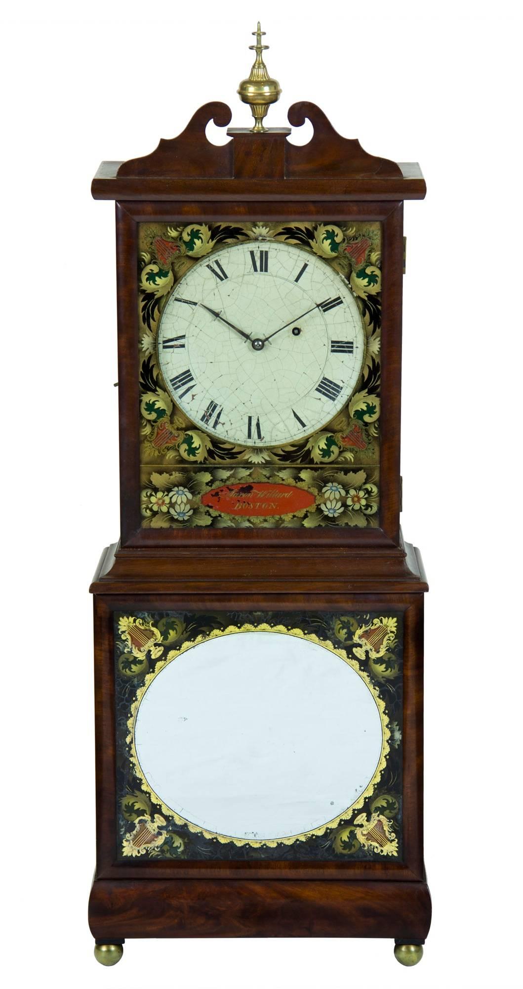 This is a beautiful, pure example of the classic New England shelf clock.  The dial and hands are all original, as are the finial, glass et al.  The case has a beautiful, historic, and untouched countenance to it, and is a fine example of the form,