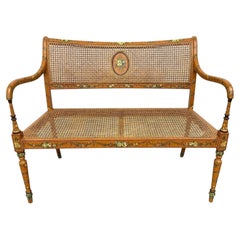 Sheraton Style Painted Floral Cane Settee With Neoclassical Detailing