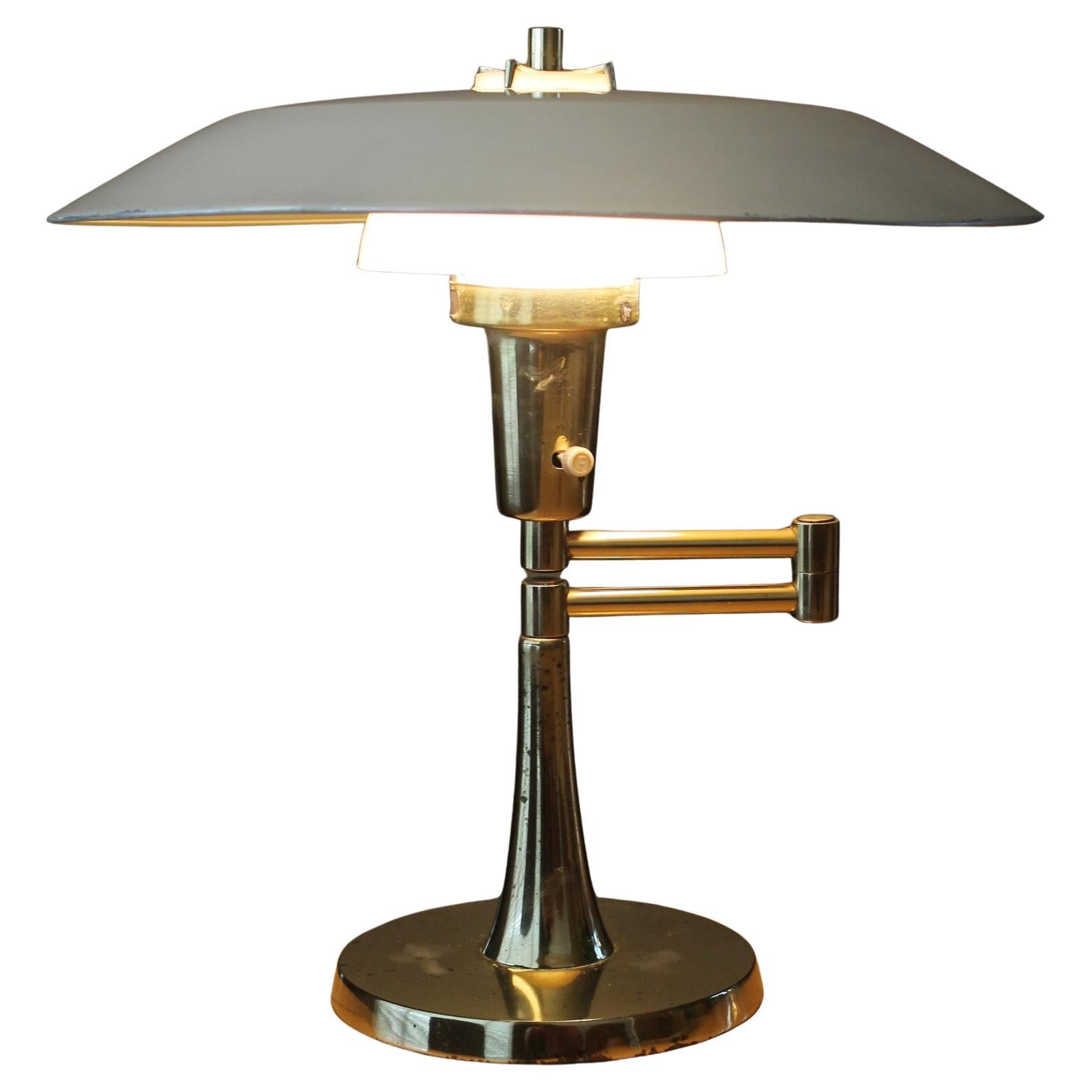  
MONUMENTALE!

TONY PAUL PER MUTUAL SUNSET LAMPS CO.
LAMPADA A BRACCIO OSCILLANTE A PIATTINO
 
Uno dei più rari design di Tony Paul!
Una costruzione incredibile e insolita!
Come si vede in Iron Man 2

APPROFONDISCI. DIMENSIONI:
ALTEZZA  :  24