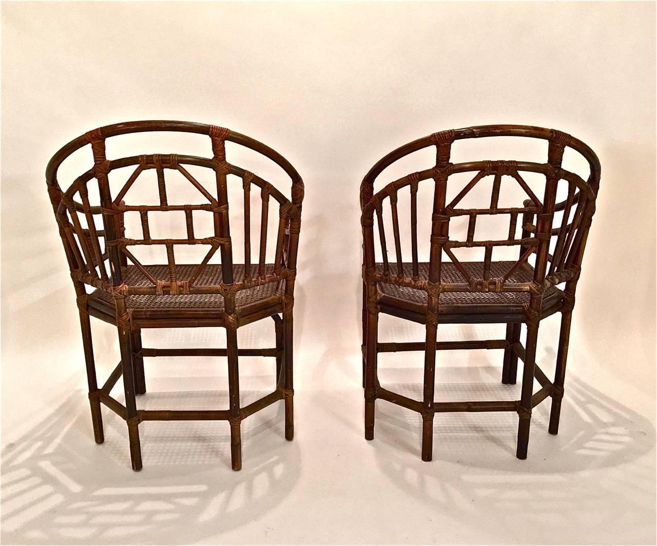 This is a great iconic set of ten Brighton Pavilion style dining chairs. The chairs date to the 1960s-1970s and are all in very good patinated condition. Four of the chairs have a slightly darker stain and one chair has had the caning on the seat