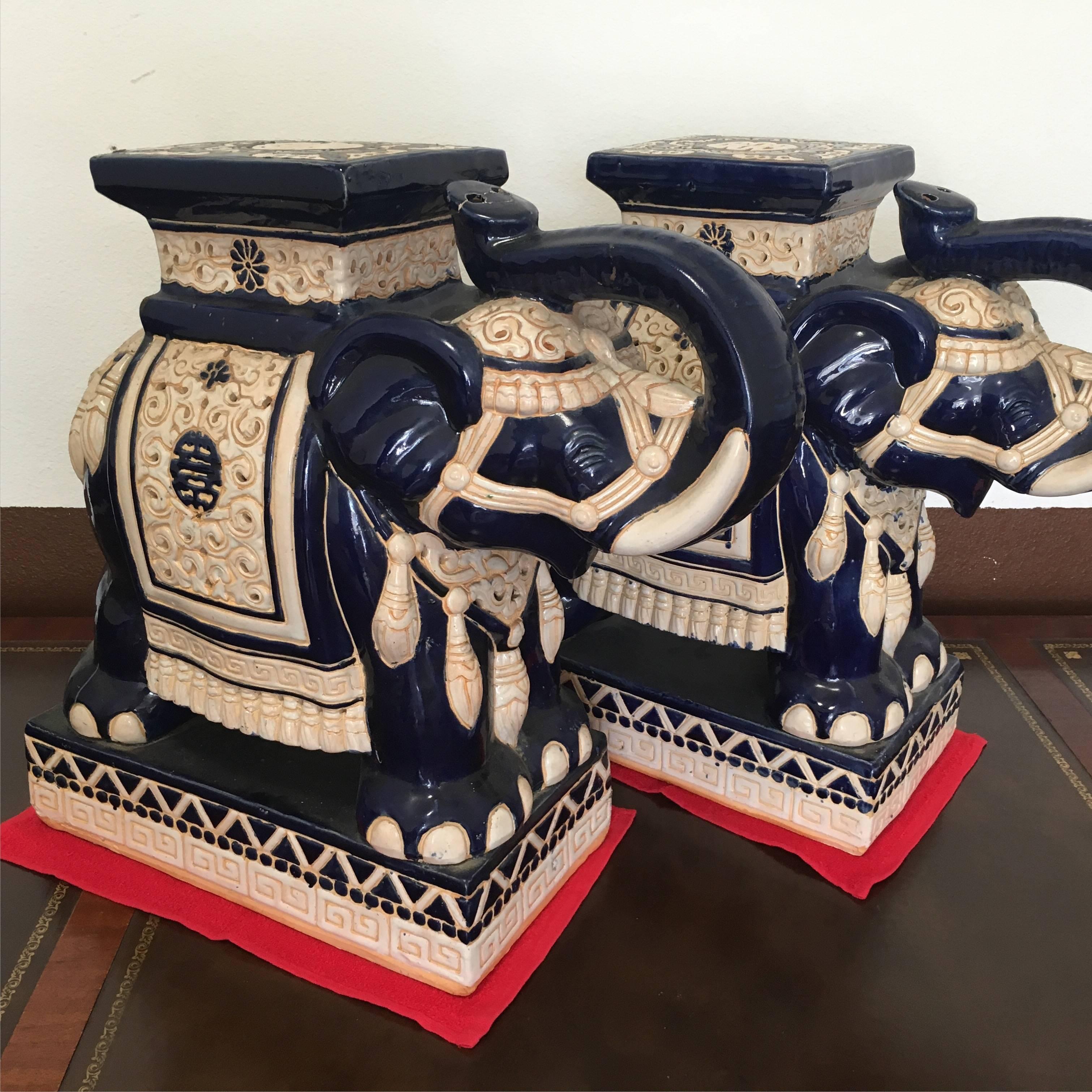 Pair of elephants, trunks up for good luck... great for the garden as stools or side tables. These elephants are in a nice blue - see our other pair in brown!