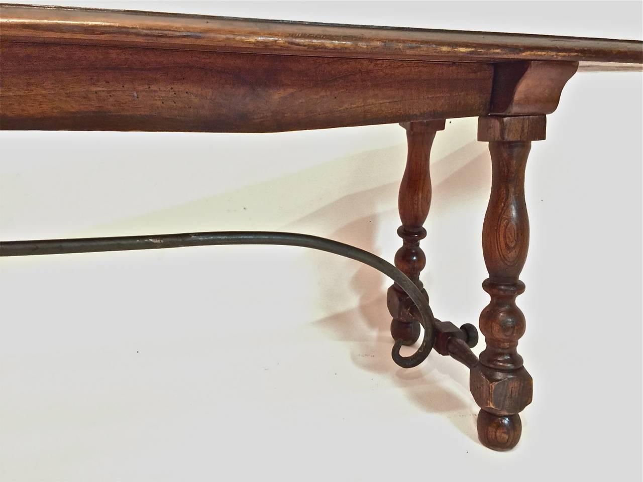 Pair of Spanish Revival Walnut Trestle Benches In Excellent Condition In Los Angeles, CA