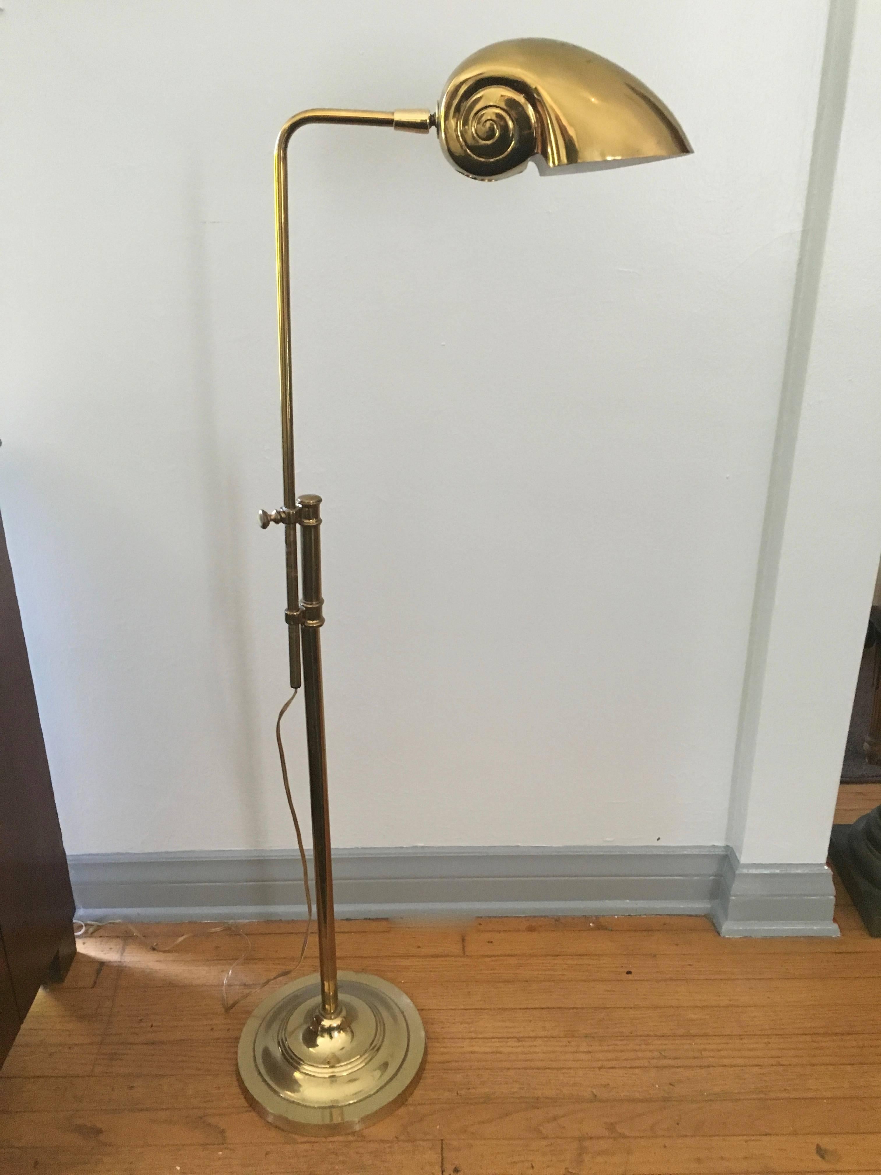 Beautifully design adjustable brass floor lamps with tilt / swivel Nautilus shell shade. A perfect addition to those living by the water or perhaps those who dream of a walk along the shore.

The lamp is adjustable from 33