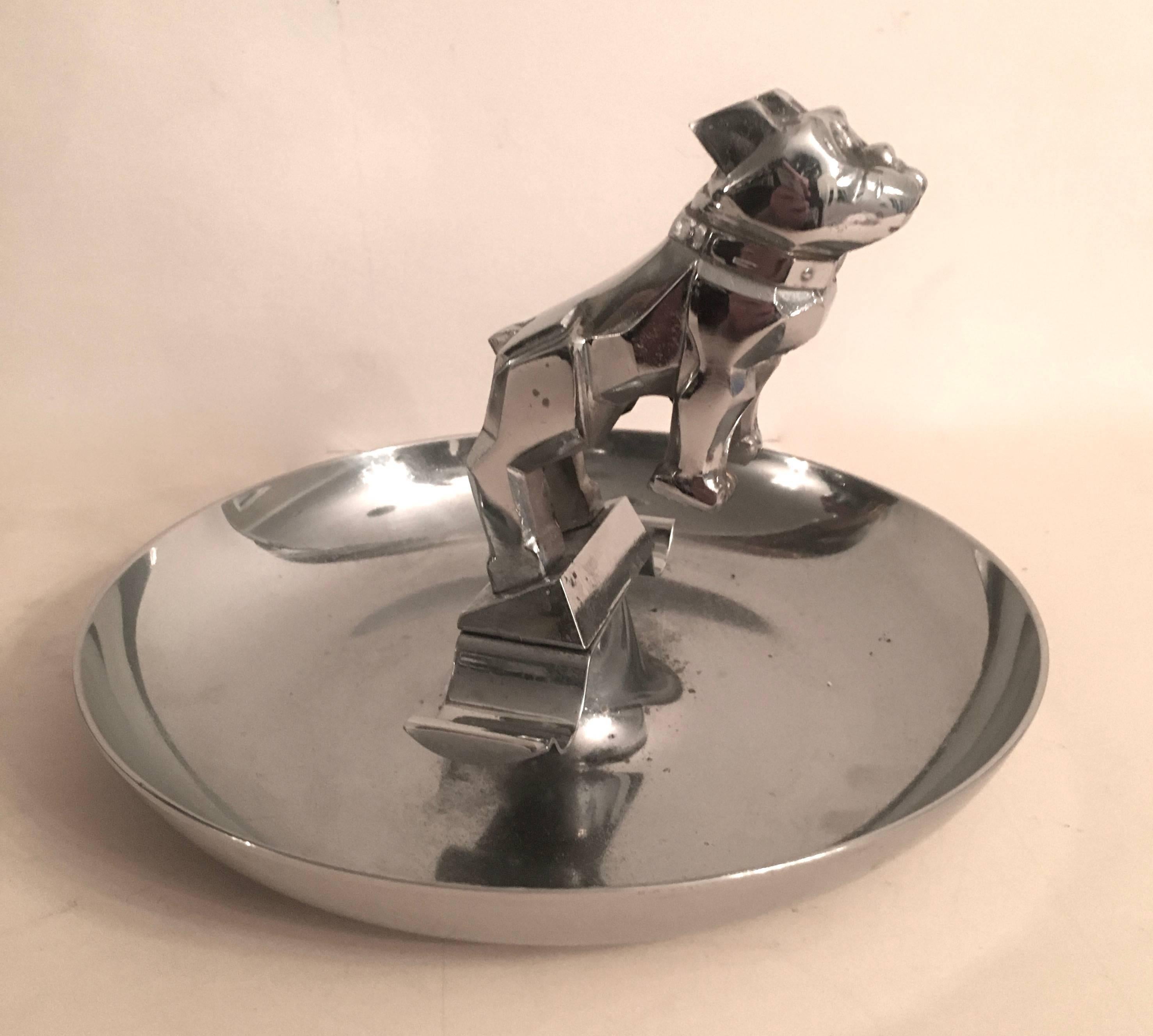 Mack truck hood ornament bulldog cigar ashtray.
Cigars are chic bulldogs don't bite and Marijuana is legal - grab a beer or your favorite port and screw the naysayers.

Light up and let this bulldog do his job, collecting ashes and compliments in