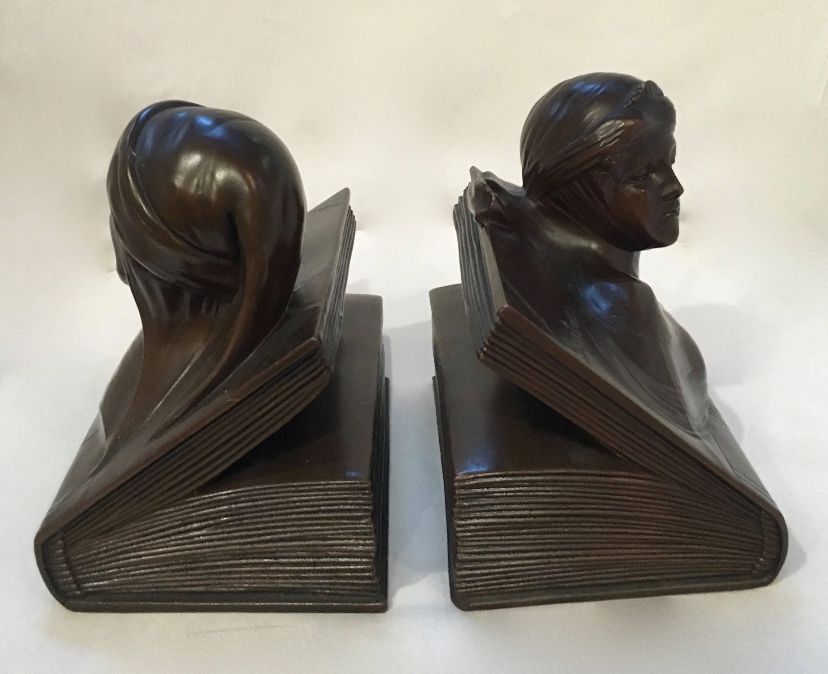 Pair of bookends with likeness of both Dante and Beatrice atop an opening book. The pair are known for their relationship to each other and poetry. A nice addition to any book shelf in any room.