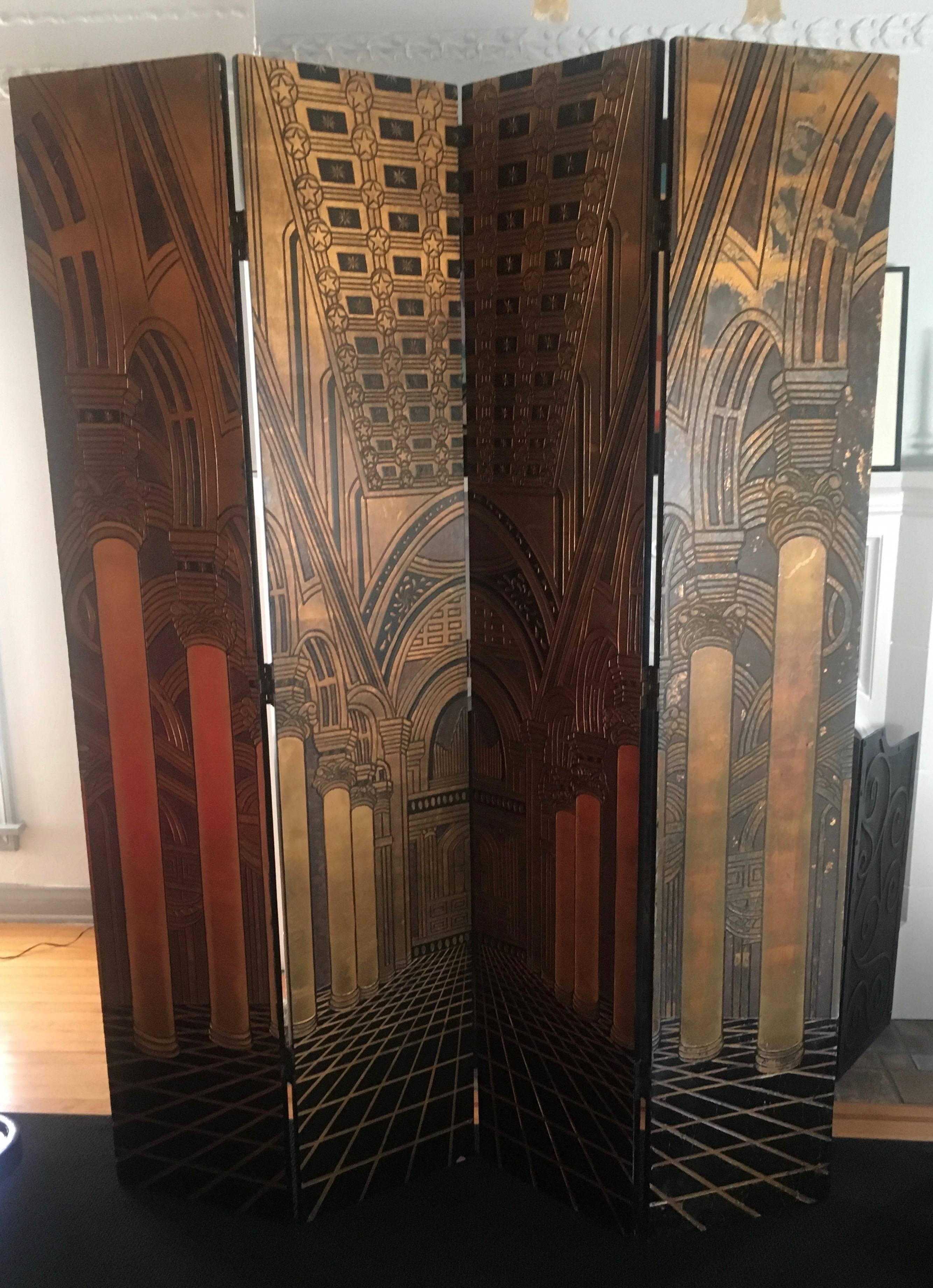 Four panel screen in carved architectural giltwood deco scene. Back of screen is black with routed red, green and yellow lines around perimeter.

Screen has a very dynamic presence, very tall with a grand presence.

The forced perspective neoclassic
