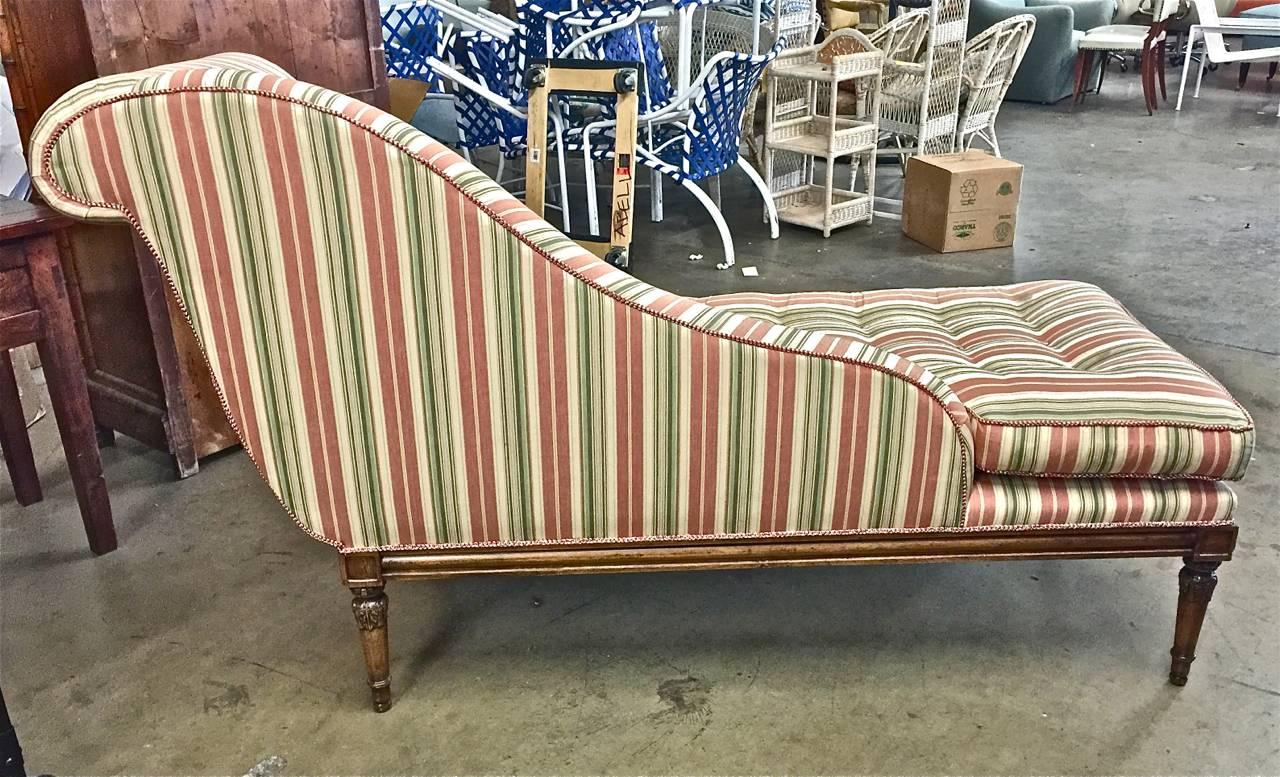 This is a beautiful example of a French Directoire Style recamier/daybed that dates to circa 1950-1960. The elegance of the neoclassical form together with the quality and detail of the vintage upholstery make this a stand out piece.