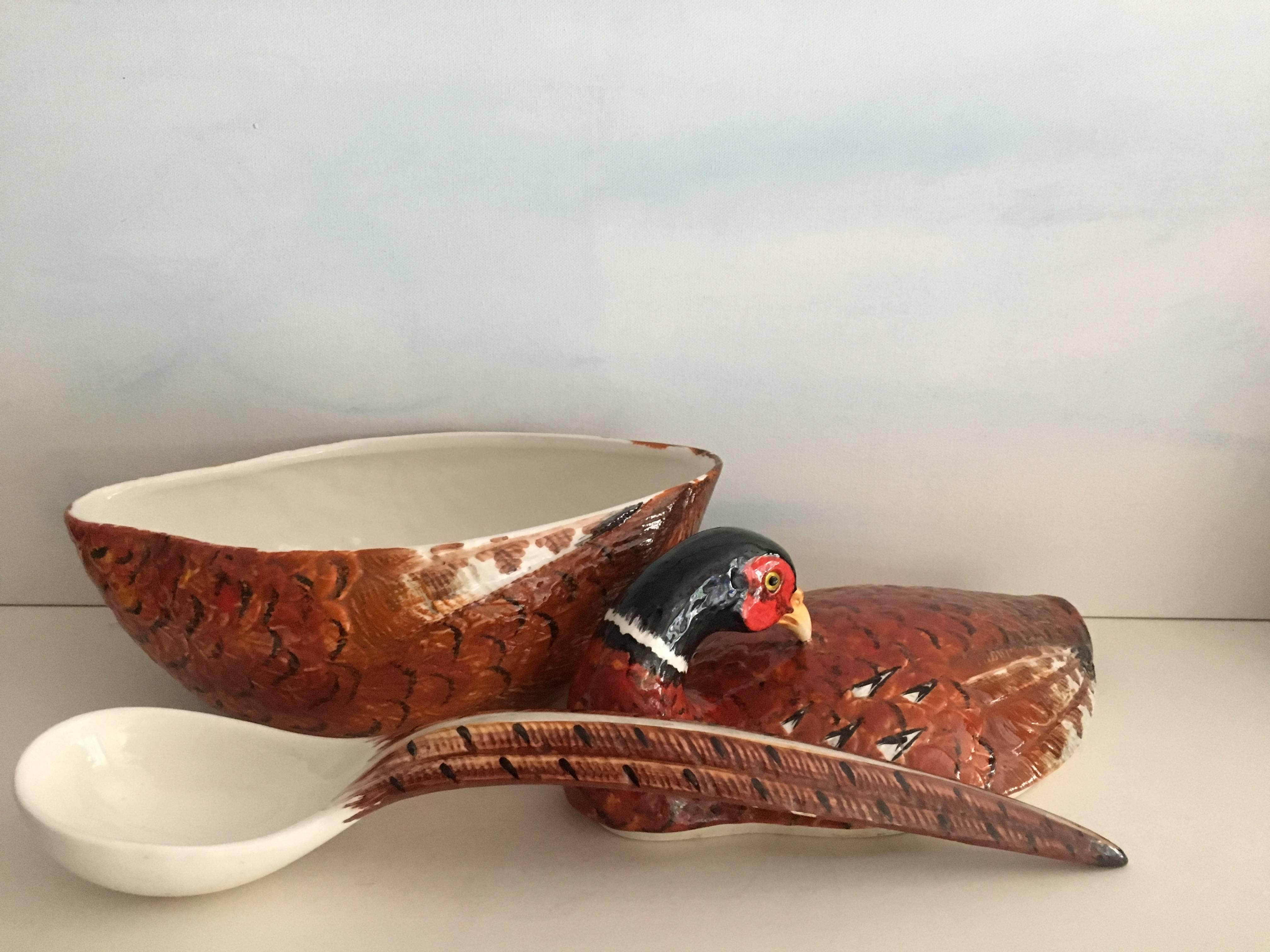 Hand-painted Italian pheasant tureen - smart design utilizes the tail as the ladle or spoon. Originally made for Neiman Marcus a very handsome addition to a holiday table.

Serving soups and stews for the holiday's or christmas!
