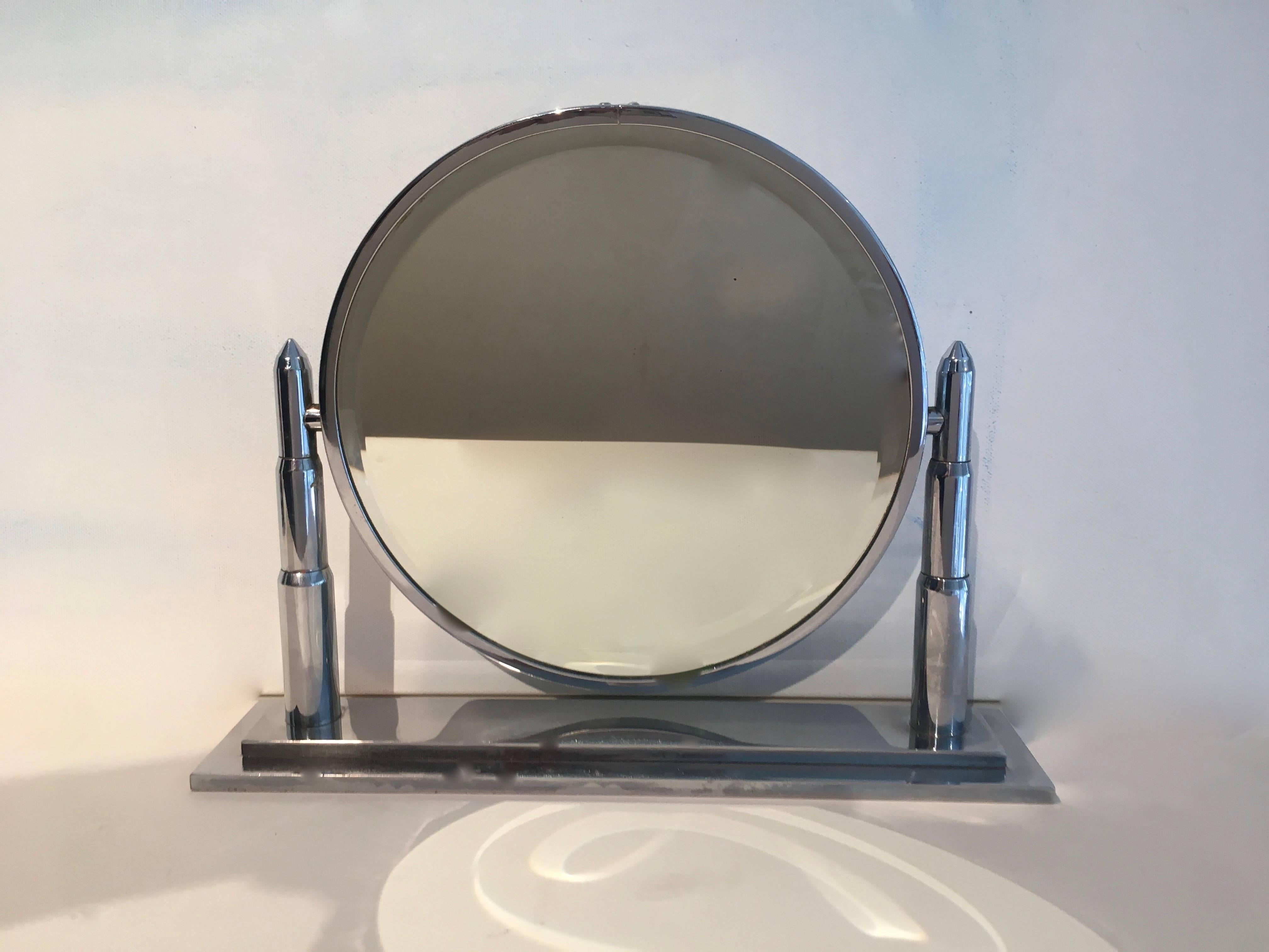 Chrome Art Deco vanity mirror with two sided mirror, one side magnifies all of your deepest and darkest secrets... but mums the word!!

This lovely deco piece will look perfect on your vanity, dressing table... or just about anywhere.
