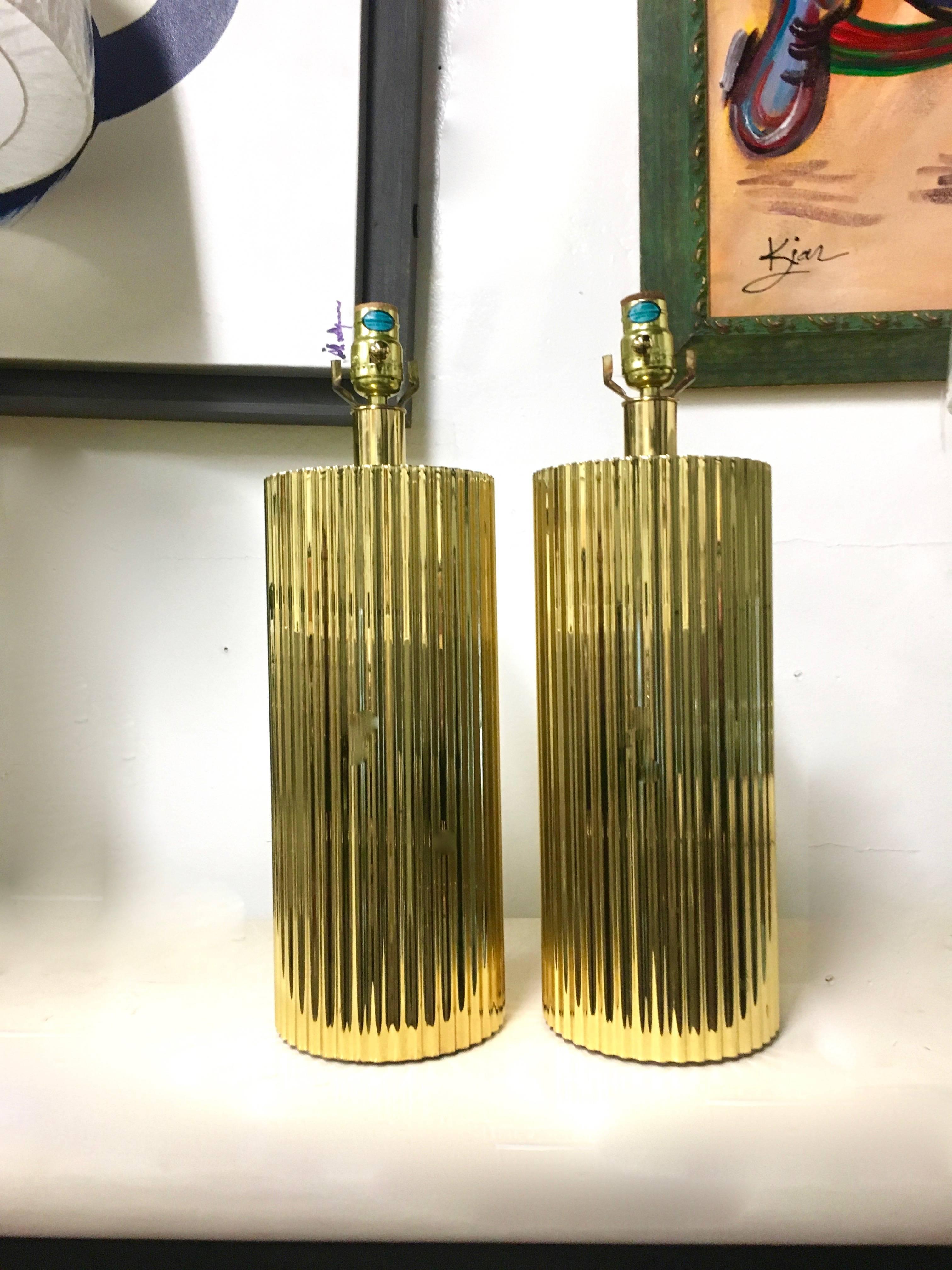 Beautifully designed brass lamps with continuous channel, the Corduroy Lamp by Harry Lawenda is a substantial and formidable statement in brass. Great for any room, from the bedroom to the Den.

Harps and shades can be purchased additionally.