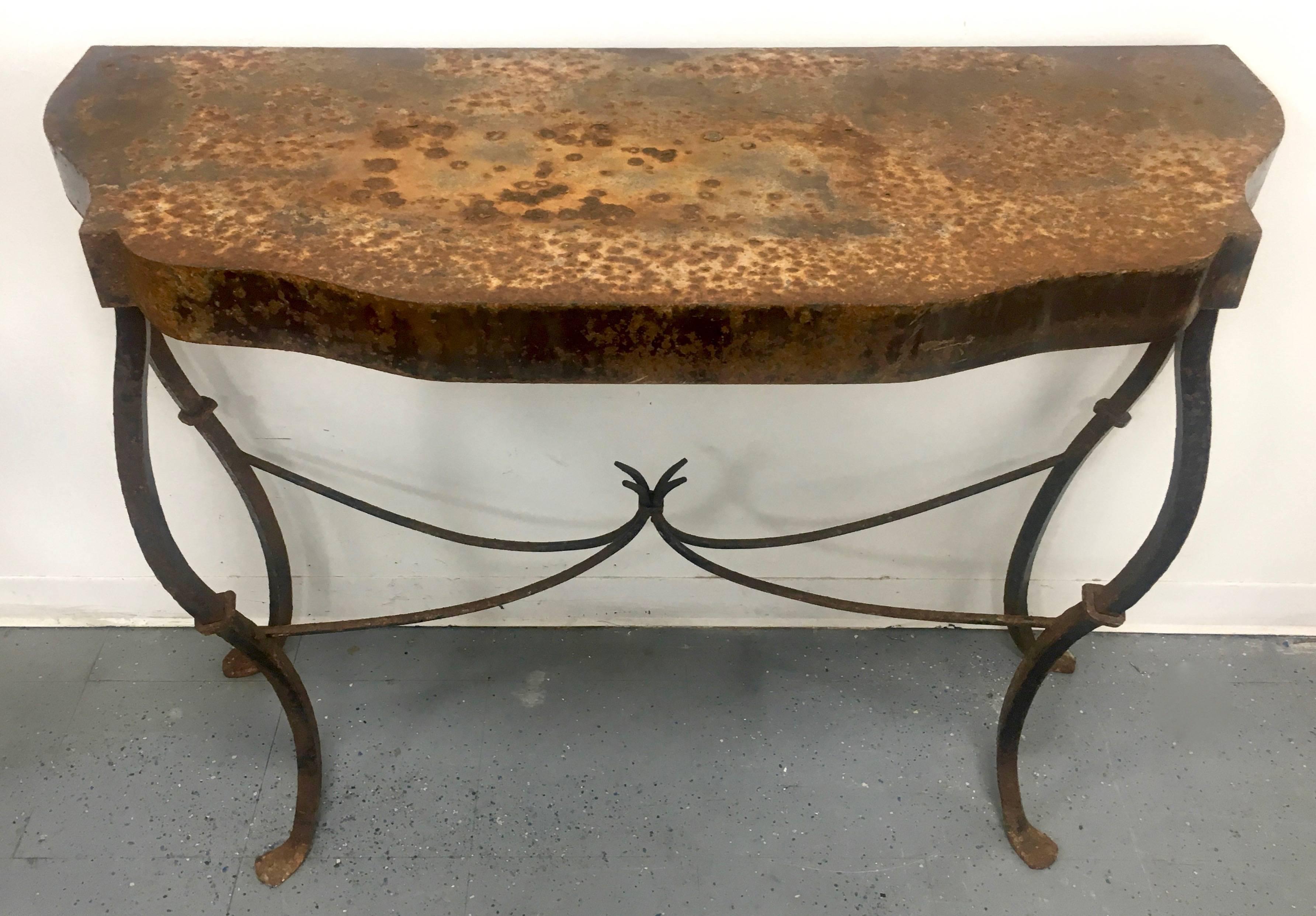 Fantastic French wrought iron table with many years of weathered patina... so amazing this cannot be made up - a compliment to the modern interior and also the French Farmhouse... with the right accessories this little gem will compliment any look.