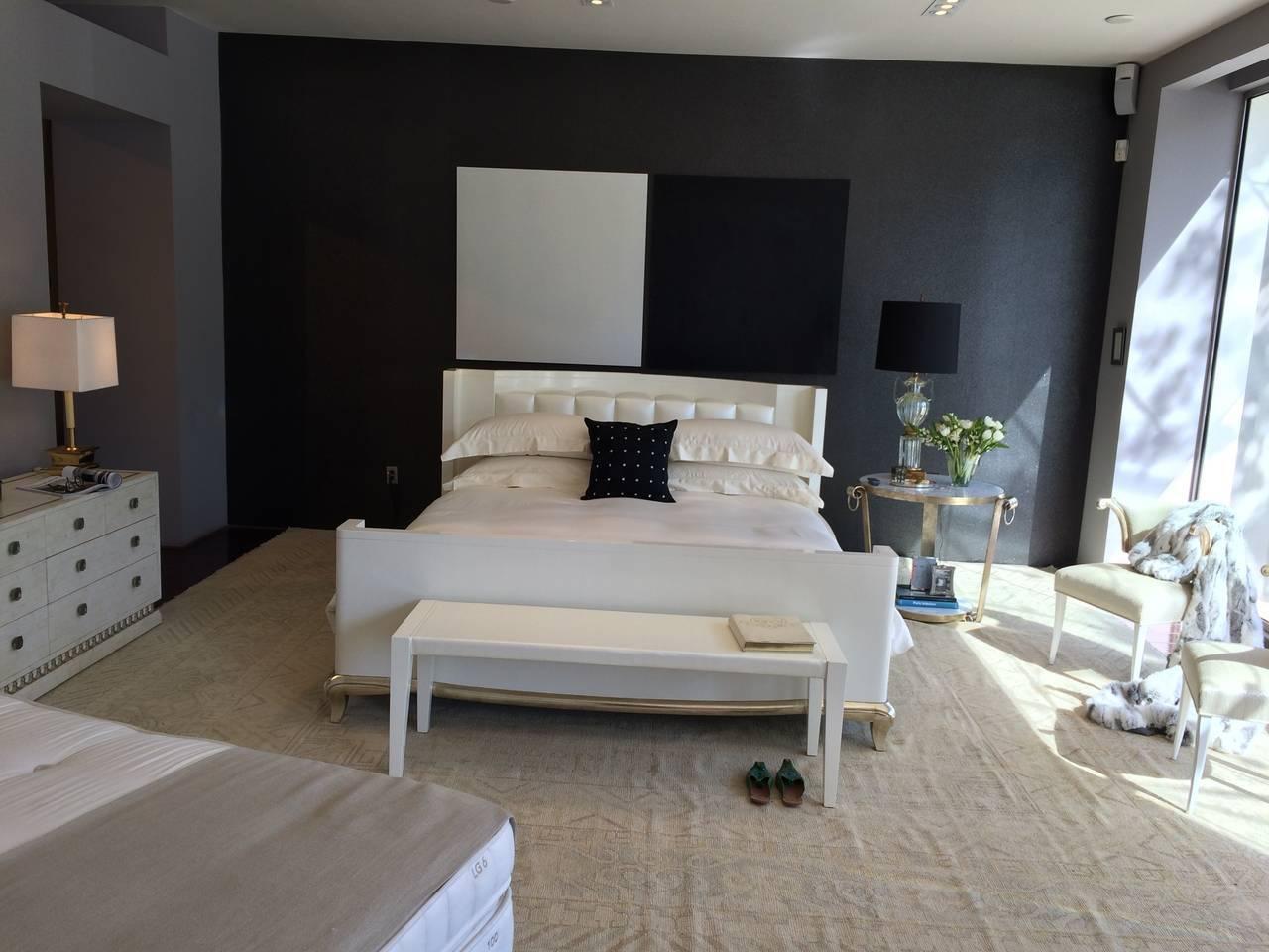 Stunning king-size bed, custom designed by Darren Ransdell design for custom comfort mattress, Beverly Hills.

The bed is Gesso over Maple - with polished white lacquer. The base details are done in White Gold Leaf. The bed is designed with a