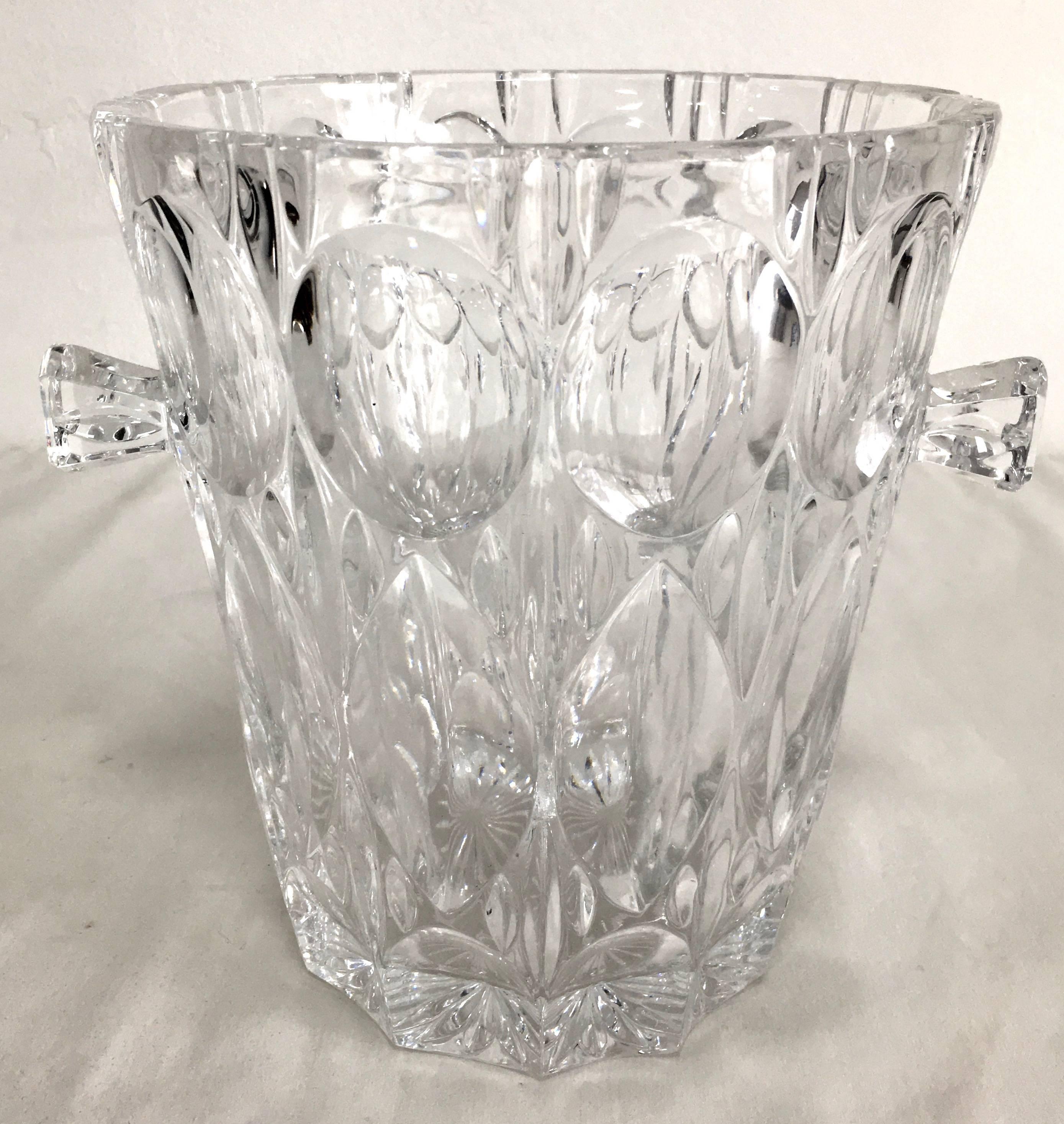 Crystal ice bucket with handles - celebrate with sophistication - a compliment to any bar - holds any bottle of wine or Champagne.