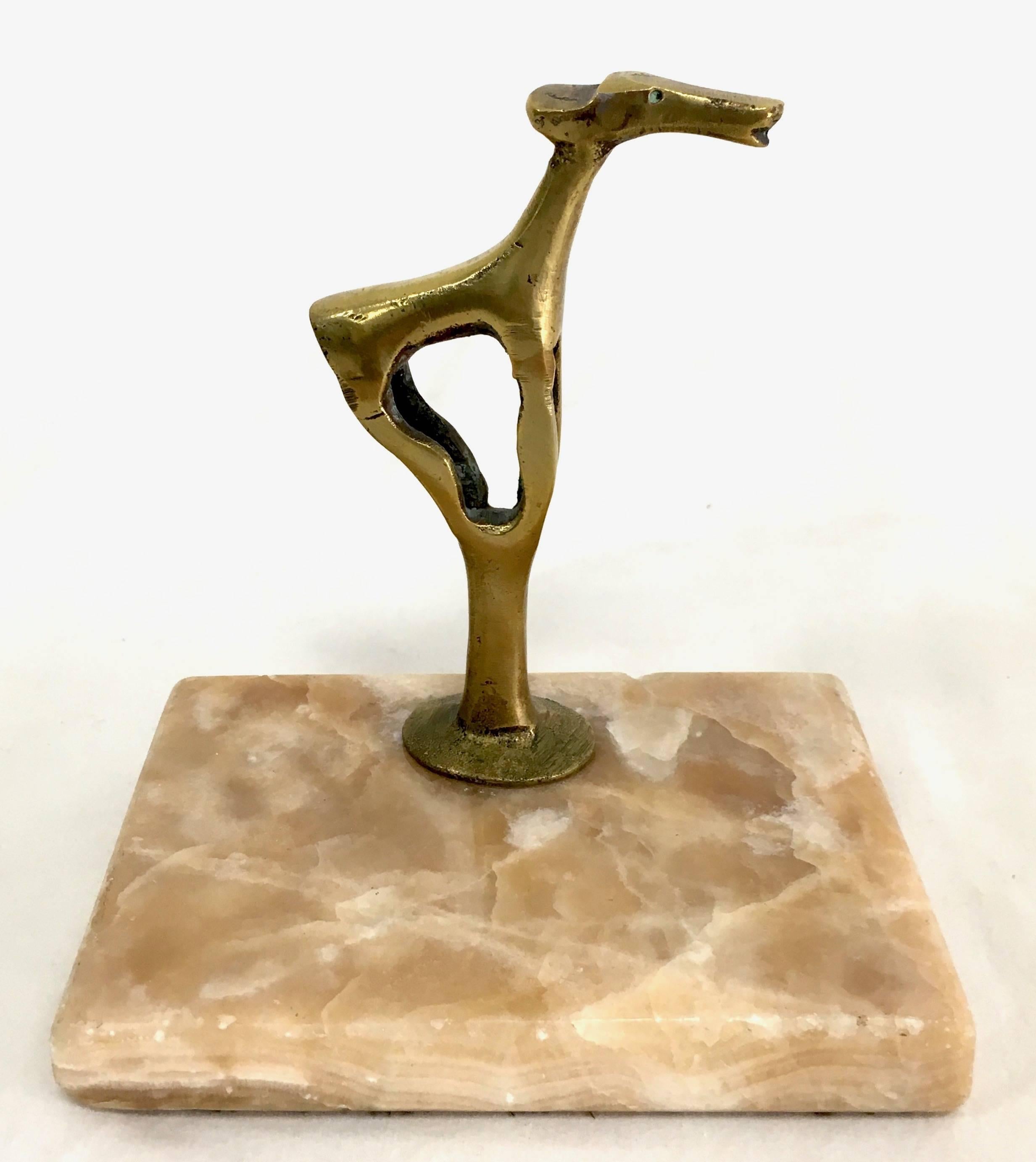 Unique marble and brass sculptural paper weight of a dog or animal.