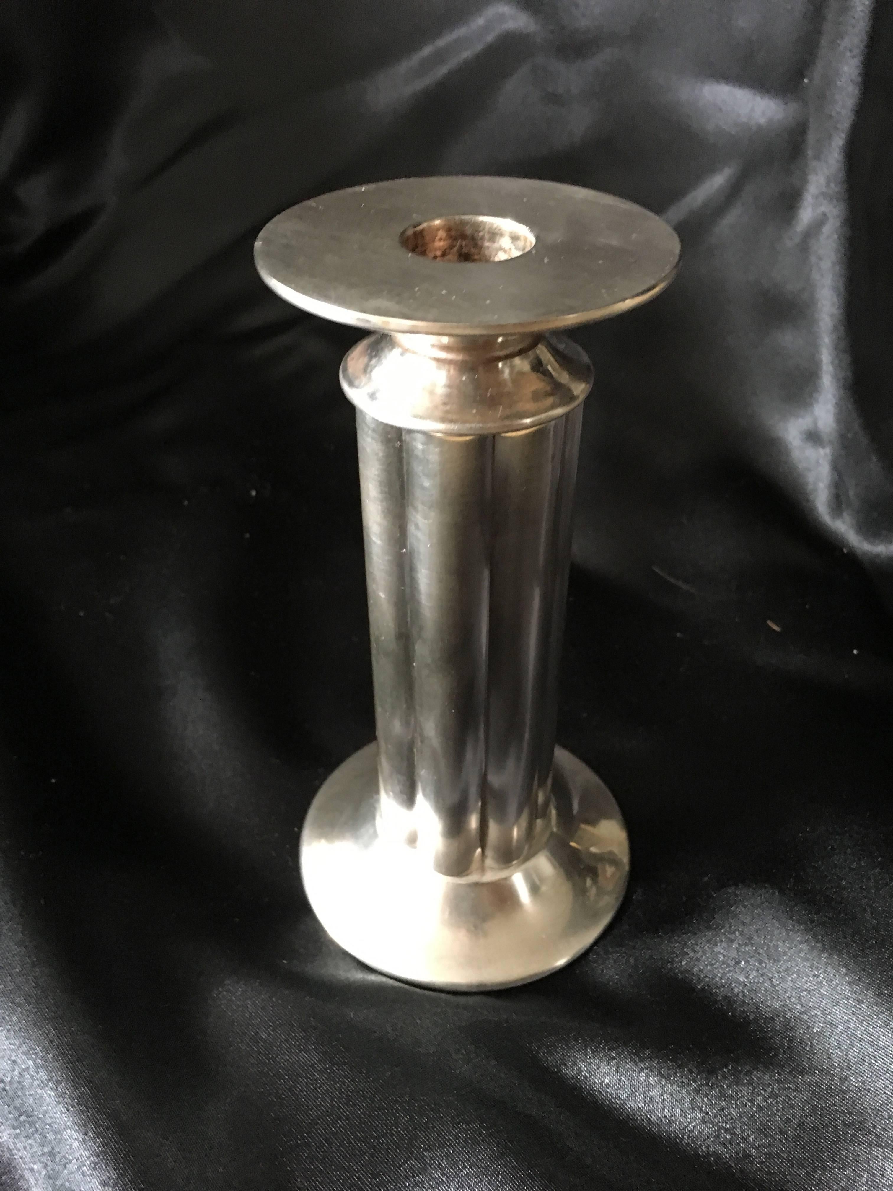 Silver plate candlestick by Robert A.M.Stern for Swid Powell - perfect added to a special selection of modern candles or on it's own.