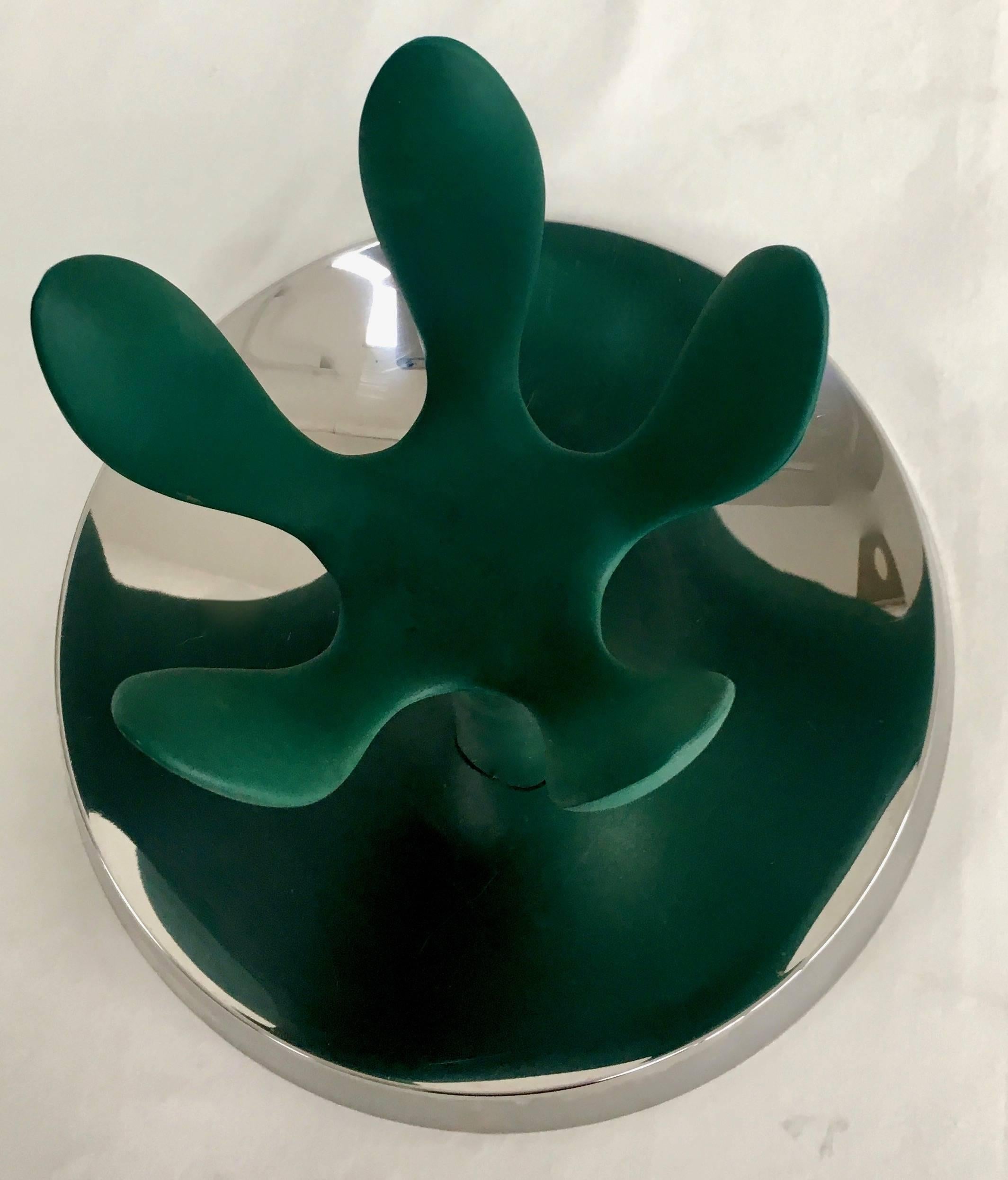 Stefano Giovannoni designed fruit mama holder. Stainless and molded plastic holder of fruit. Classic Alessi for use anywhere. A compliment to the Modern and sleek room or a fabulous pop in a traditional setting.

  