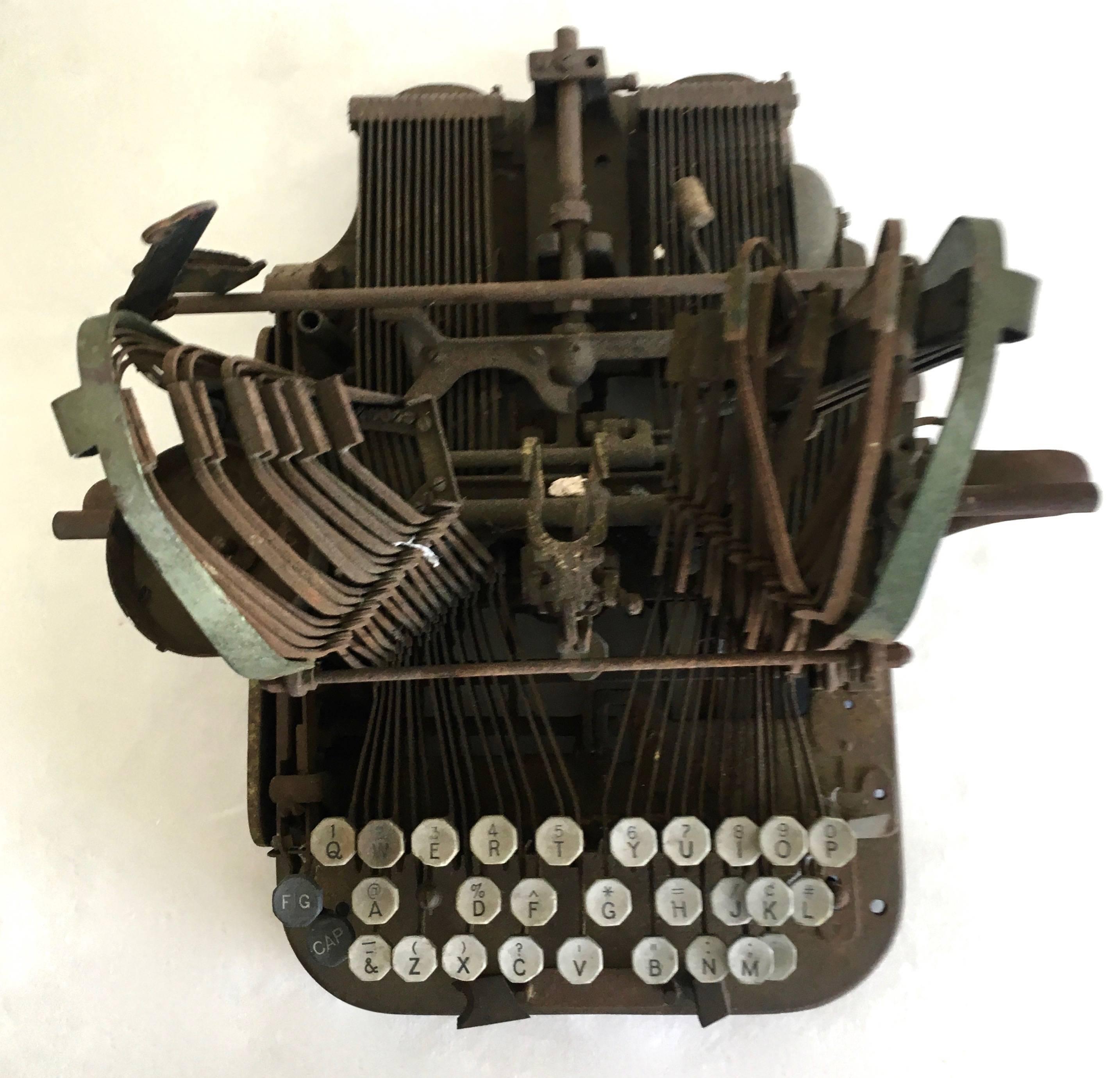 Found art perfectly patinated type writer ready for immediate viewing. Great for the producer, writer or secretary in you lovely sitting atop a pile of books as well as on a shelf in the Library or Den a really amazing find, one of a kind.