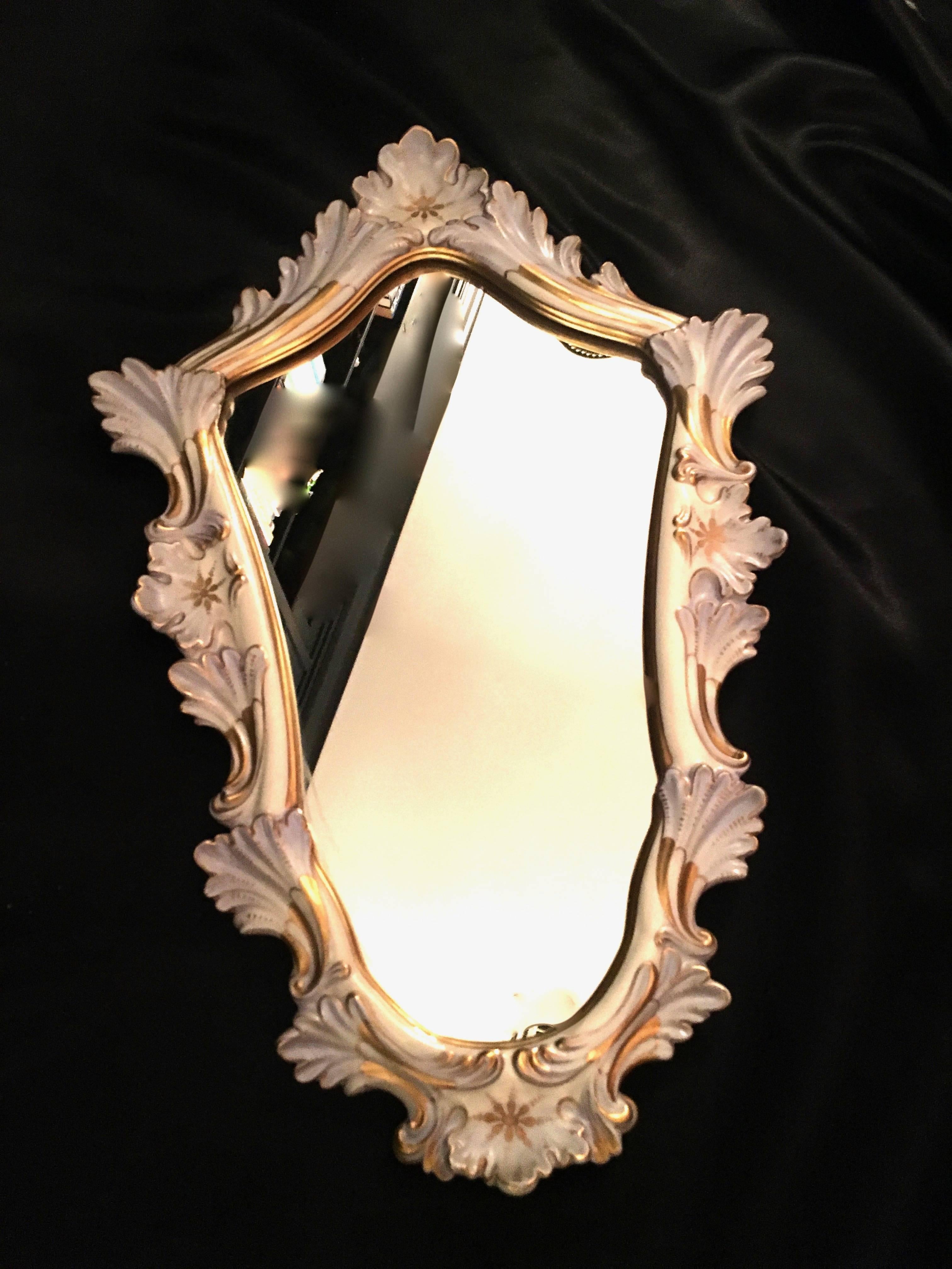 Italian Majolica mirror. A lovely accent to a lonely wall or grouping.