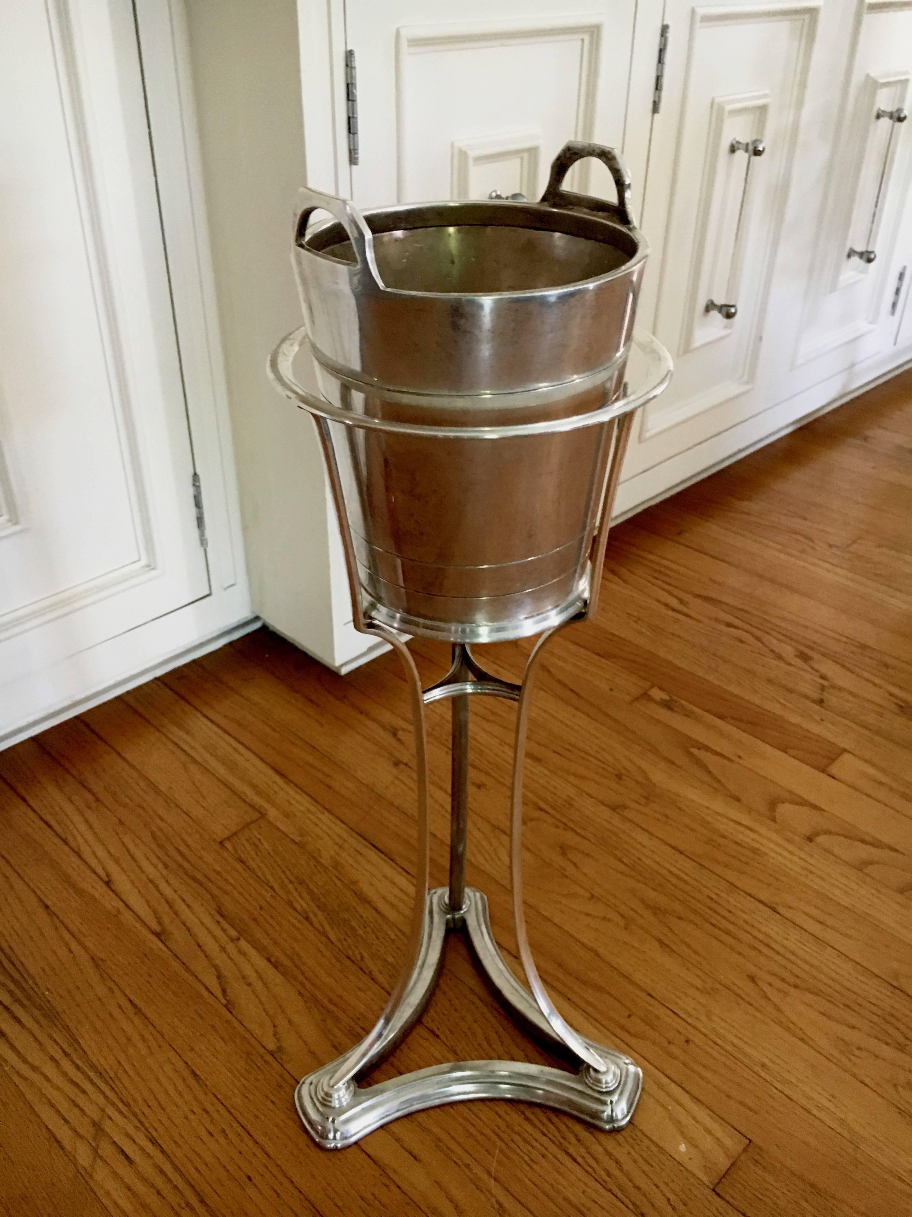 Silver plate Champagne wine bucket in stand - this ice is a very nicely made and high quality piece - ready for your next party or event.

The size is such that it would work well in any setting, table side, bed side, in the office or your next