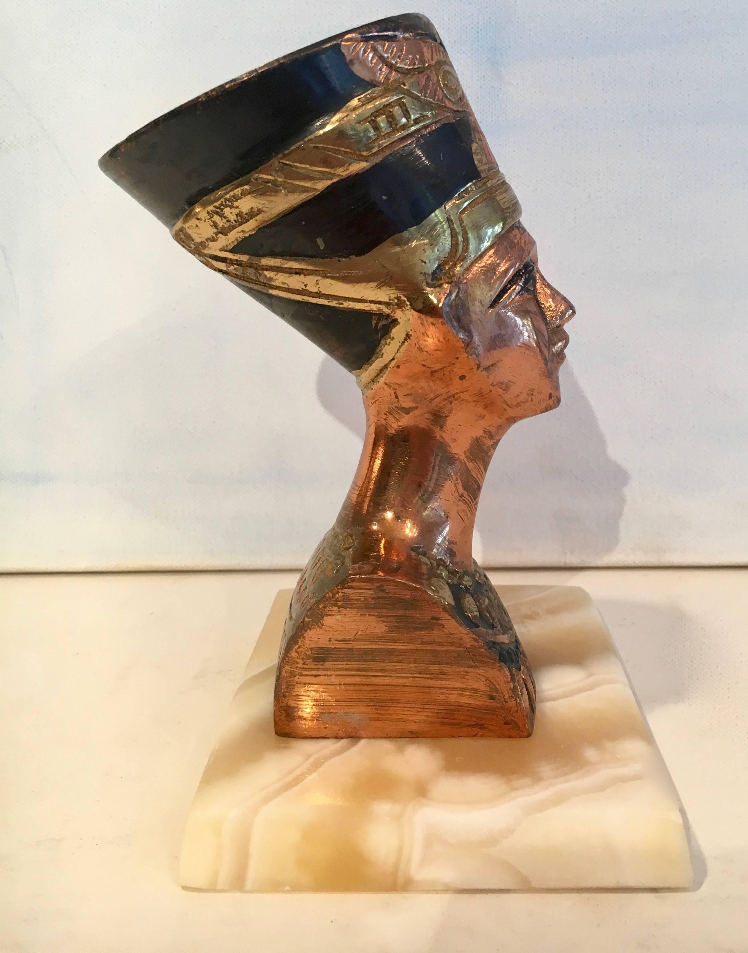 Cleopatra or Sphinx Statue, perhaps a collectible Museum sold piece.

Makes a great paper weight of simply decor on a nearby shelf, suited for any room.