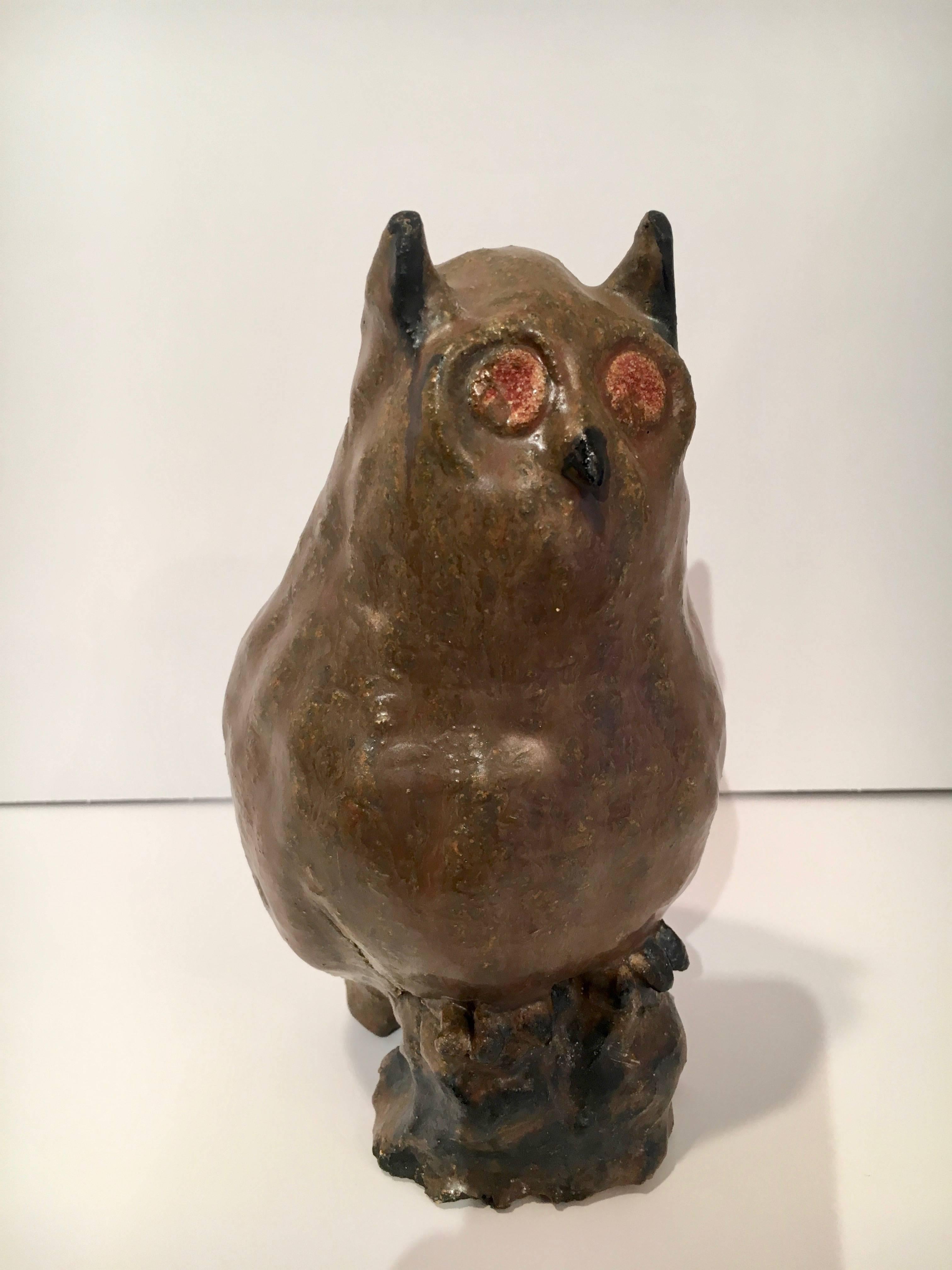 Folk Art clay owl sculpture - a unique and handmade sculpture of an owl. Darren Ransdell Design has many sculptures. This piece is a compliment to any shelf or desk - perhaps sitting atop a stack of books?
     