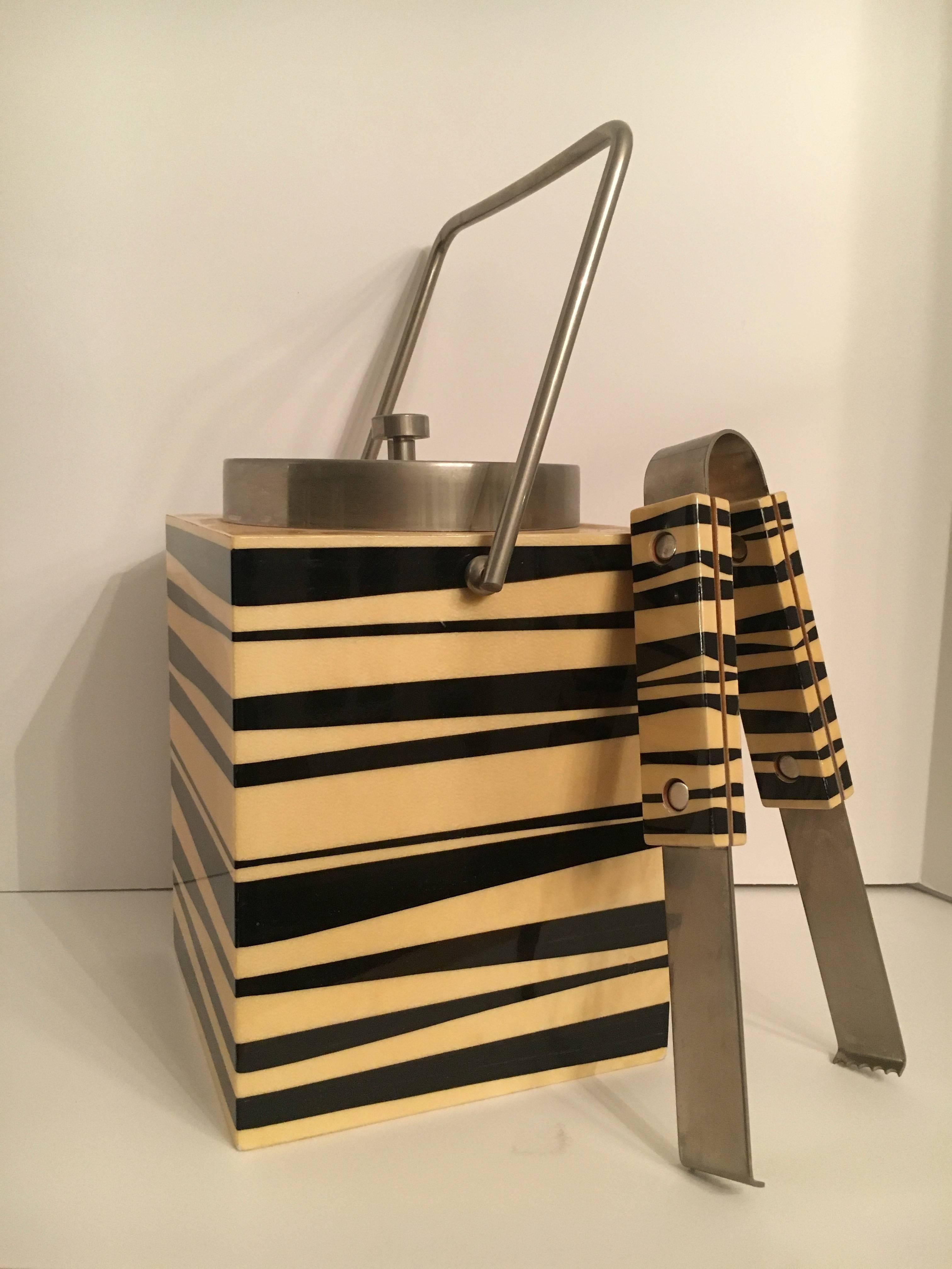 Aldo Tura goatskin ice bucket with tongs, this ice bucket really is the ice breaker, we gasped when we found this jewel! The beautifully designed bucket with modern striped reminiscent of something between animal and high style made us want a stiff