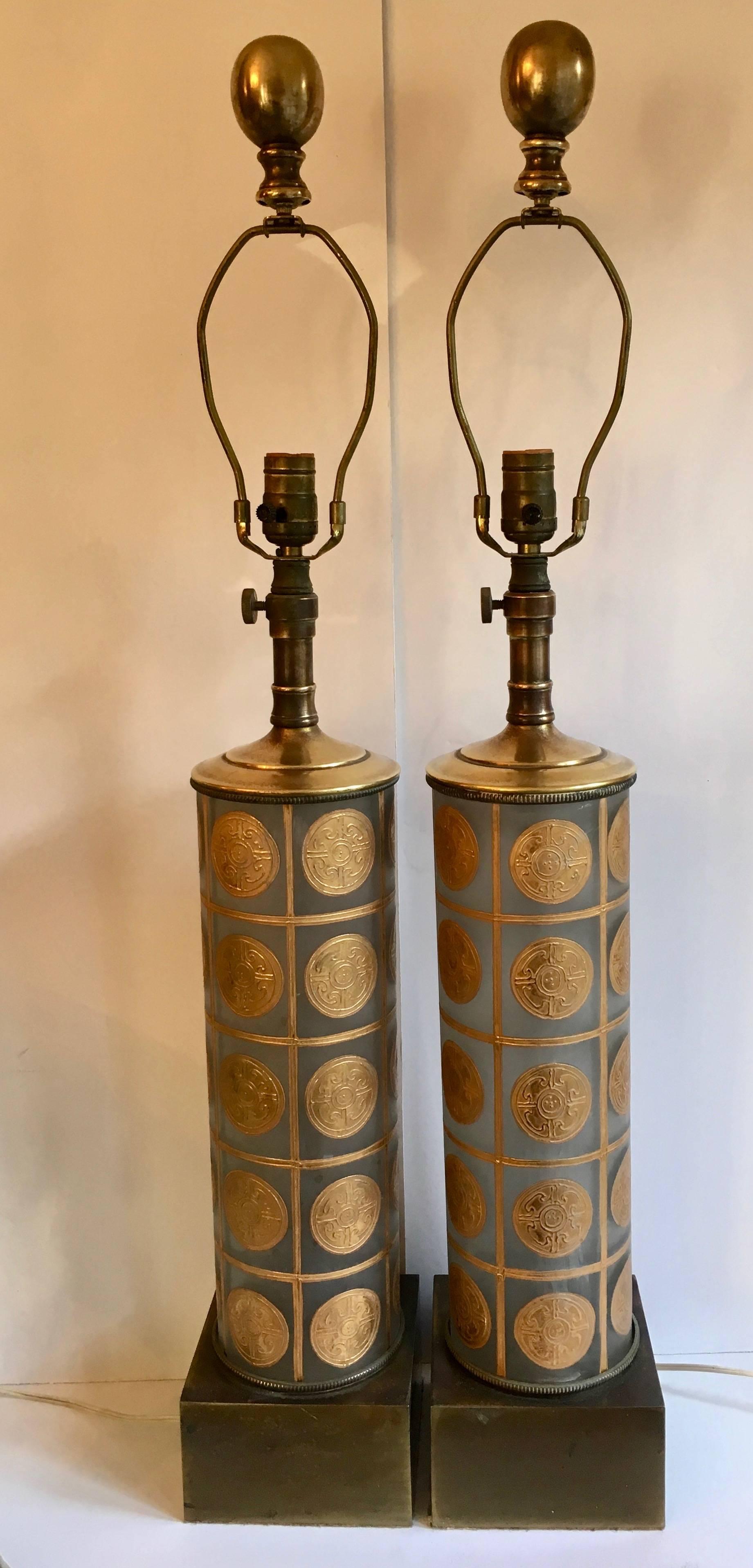 A spectacular pair greatly echoing the design of Versace. Shhh I won't tell if you don't.

Frosted glass with gilt medallions and beautifully Patinated base and stem. The stem is adjustable to add 2