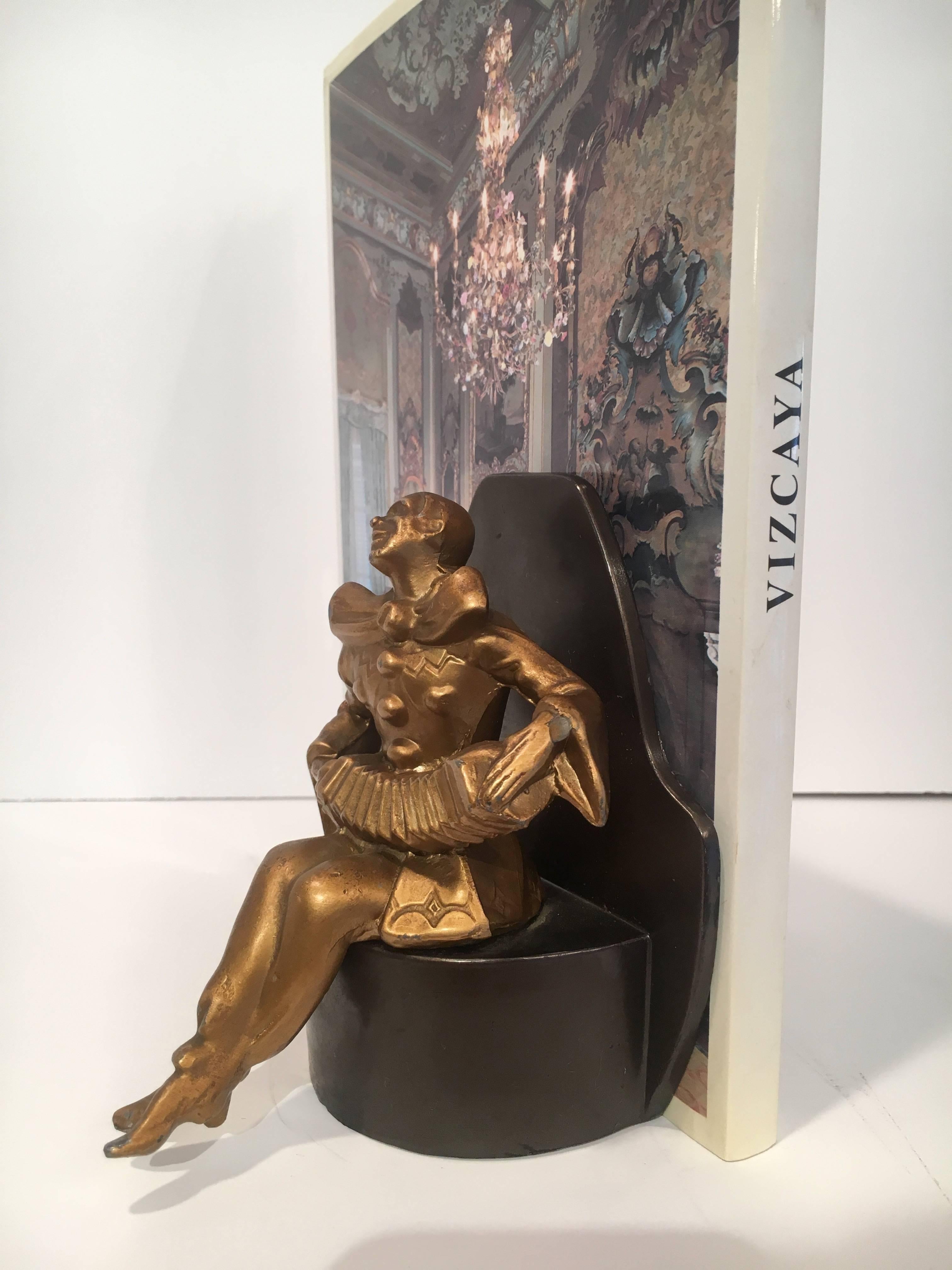 Metal Art Deco Gold Jester Bookend on Black Base For Sale