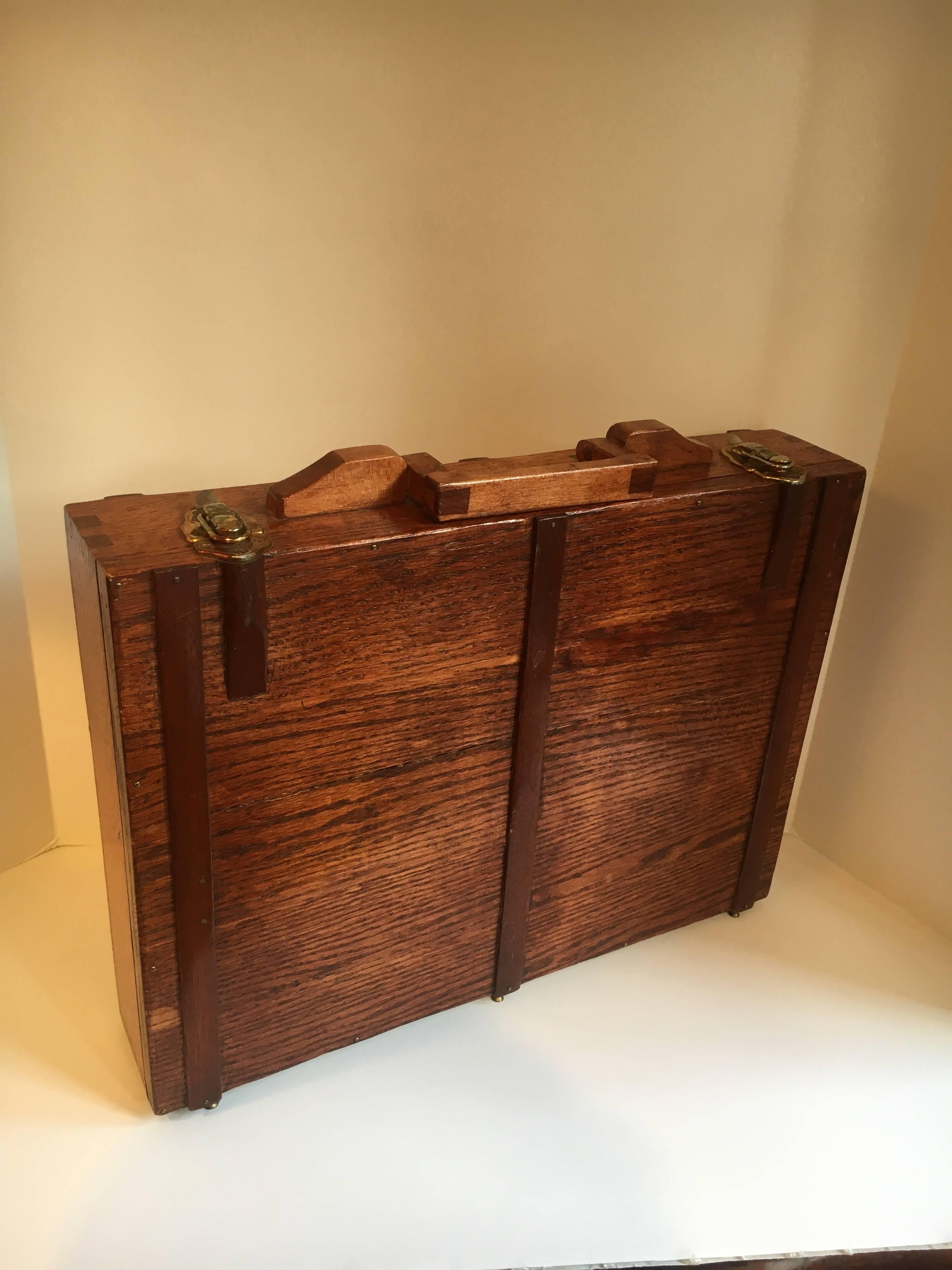 A handsome and well made wooden briefcase/ attache case - designed to hold pencils and more... great for stashing money, art or documents... a real work of art.