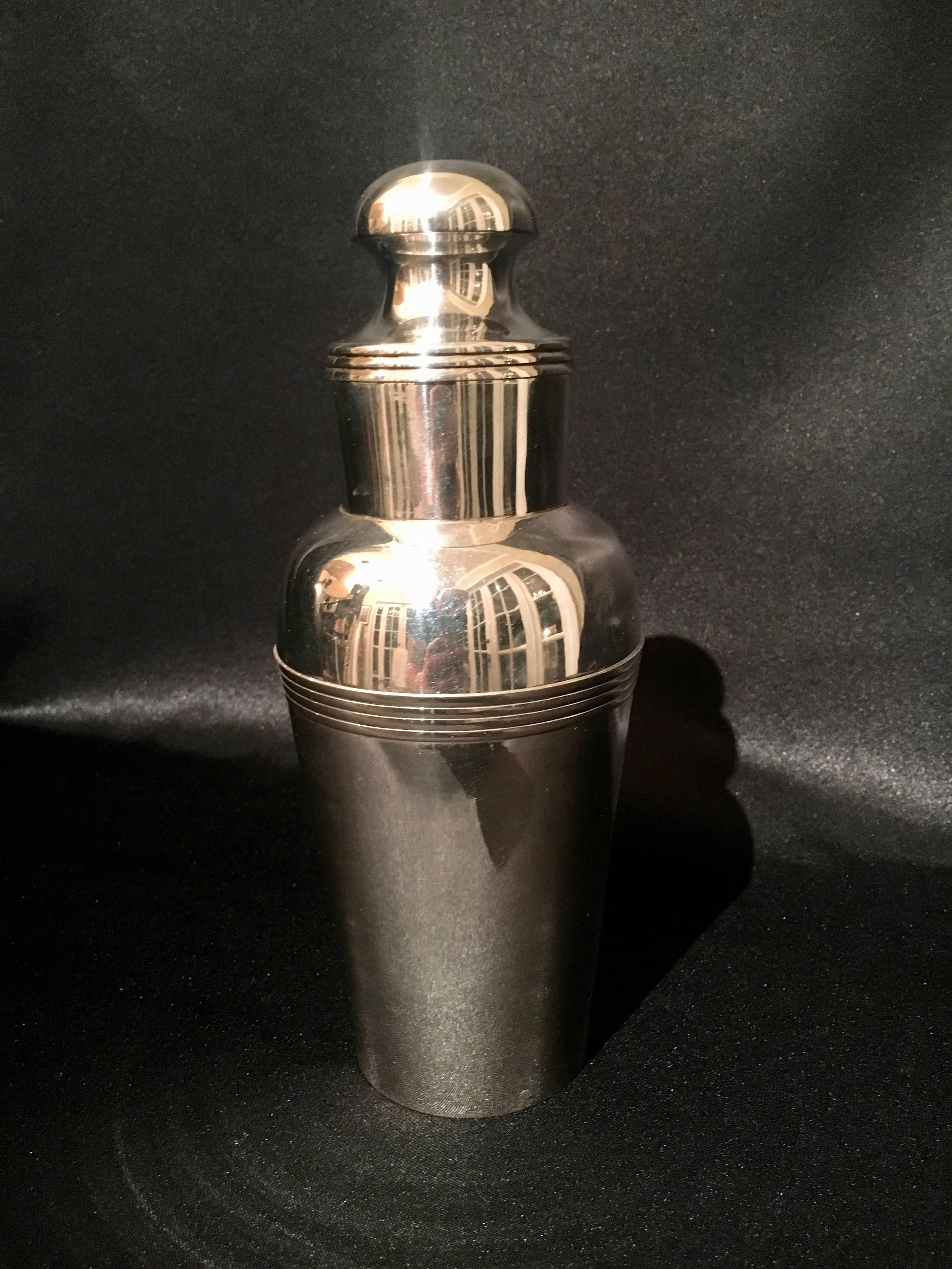 Silver Plate Cocktail Shaker - if you love to be the bartender or have a bar your friends envy - then your missing one thing!  This stunning Cocktail Shaker - truly a beauty!  The substantial metal framework is a gorgeous design befitting the