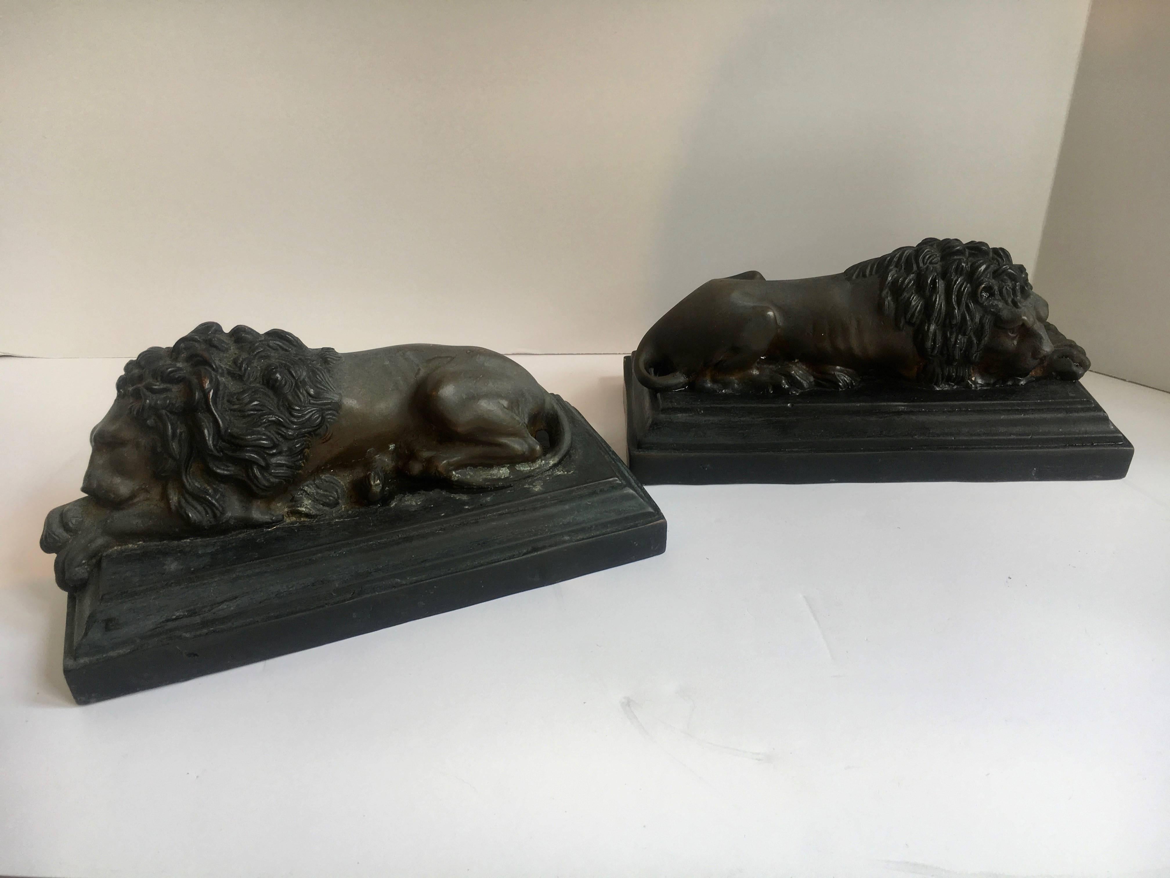 Pair of Bronze Recumbent Lion Sculpture Bookends In Excellent Condition In Los Angeles, CA