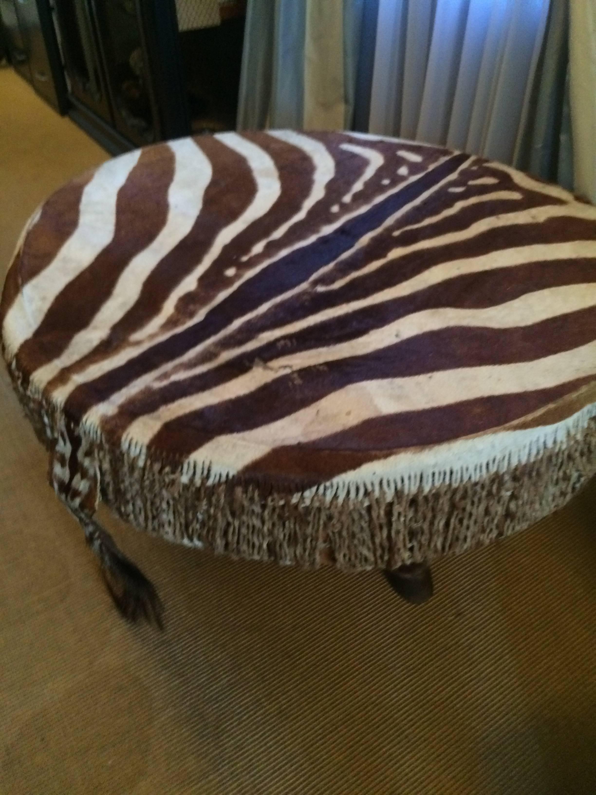 This is the piece that makes for a great conversation and adds depth to many interiors. Authentic zebra skin table in very good condition and ready for any room; 24