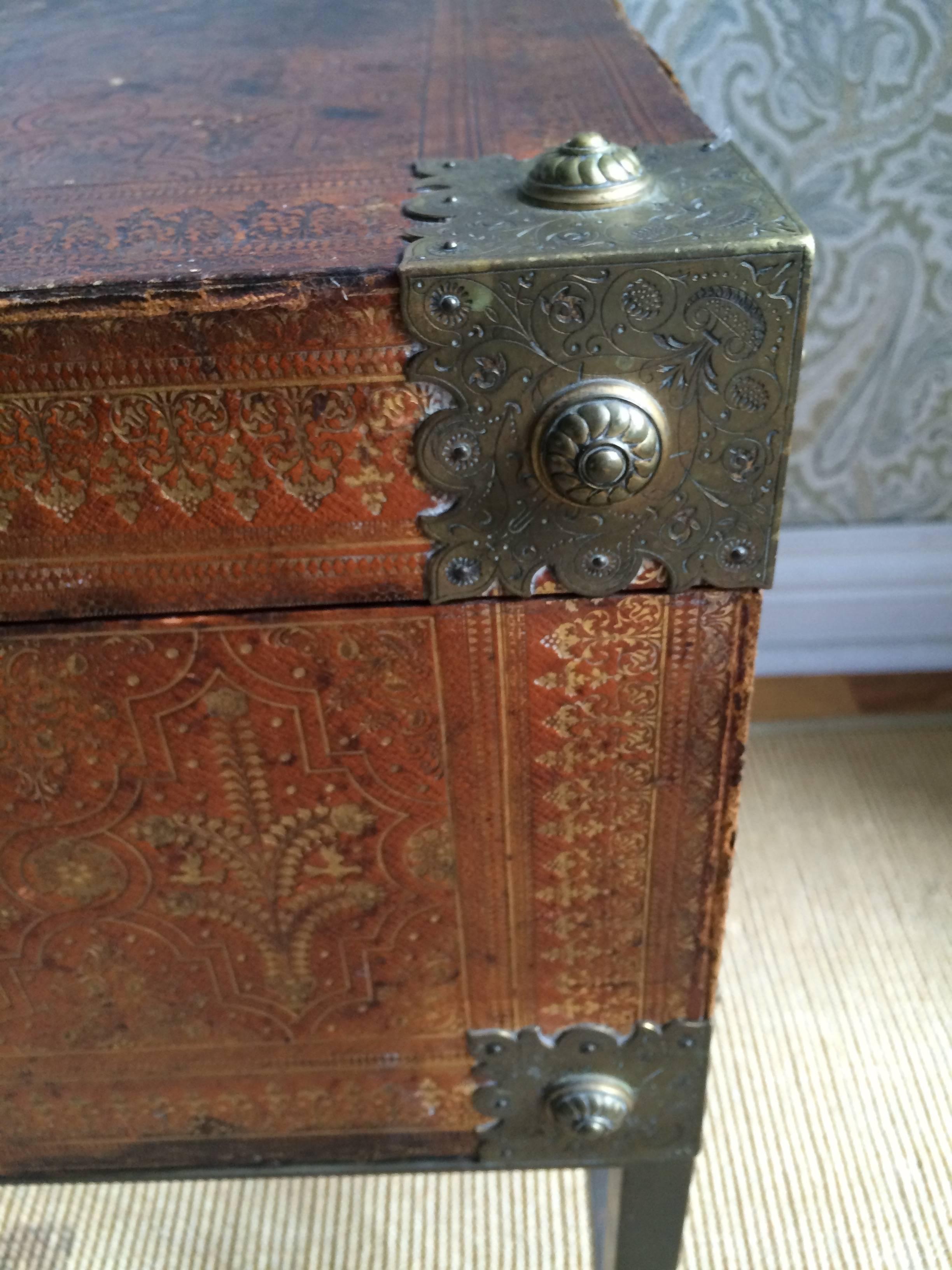 Beautiful leather tooled French box with upholstered interior. This box previously housed an inside shelf on top that is no long with the piece. The key is not functional, but they box appears to from the 19th century. The box which is perfectly