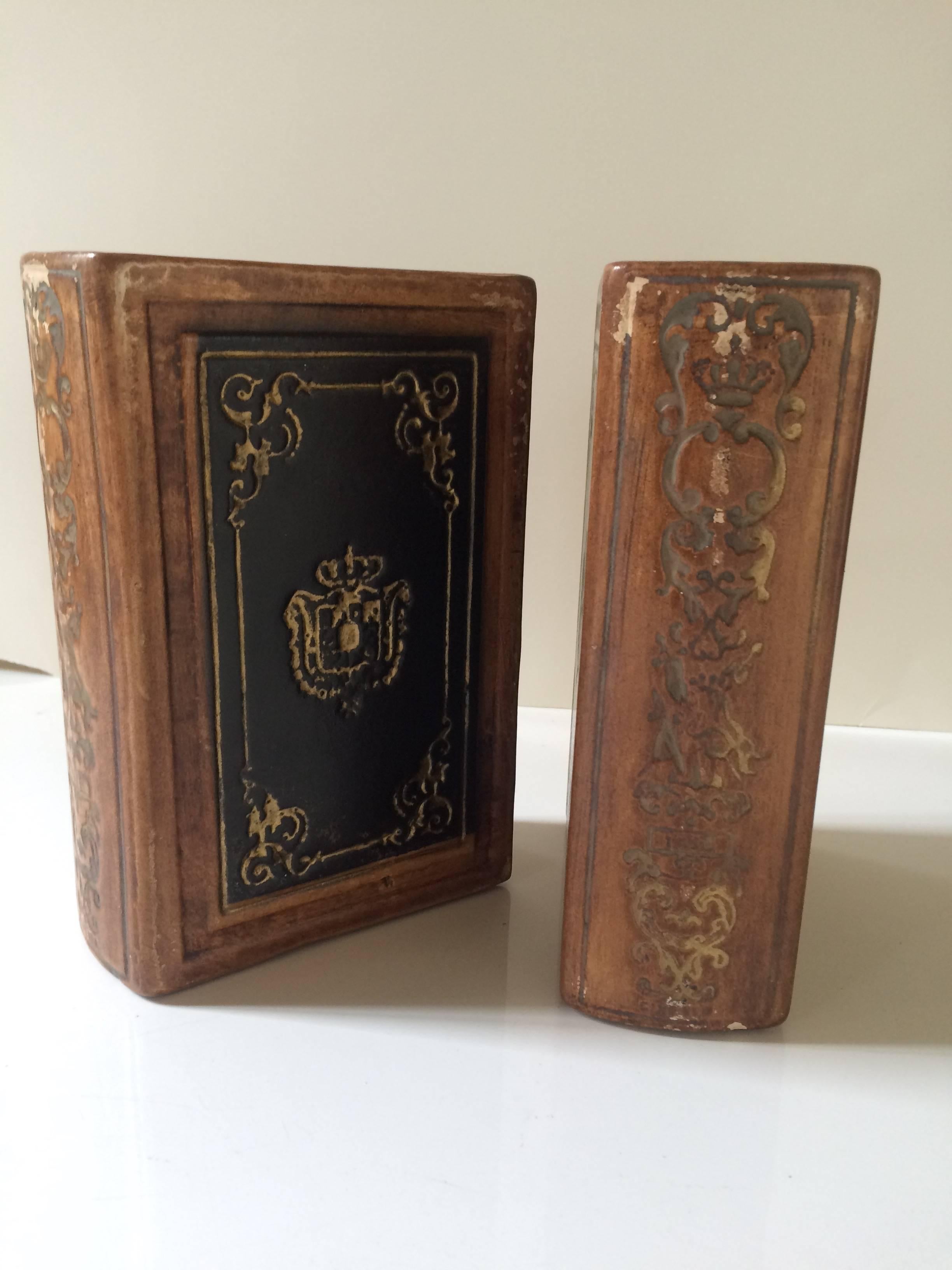 Quite a cleaver pair of bookends, while having the look of real leather bound books, the pair are actually bookends! Very heavy and substantial this pair make a great addition to your book cases throughout the house and in the kids room.

Due to