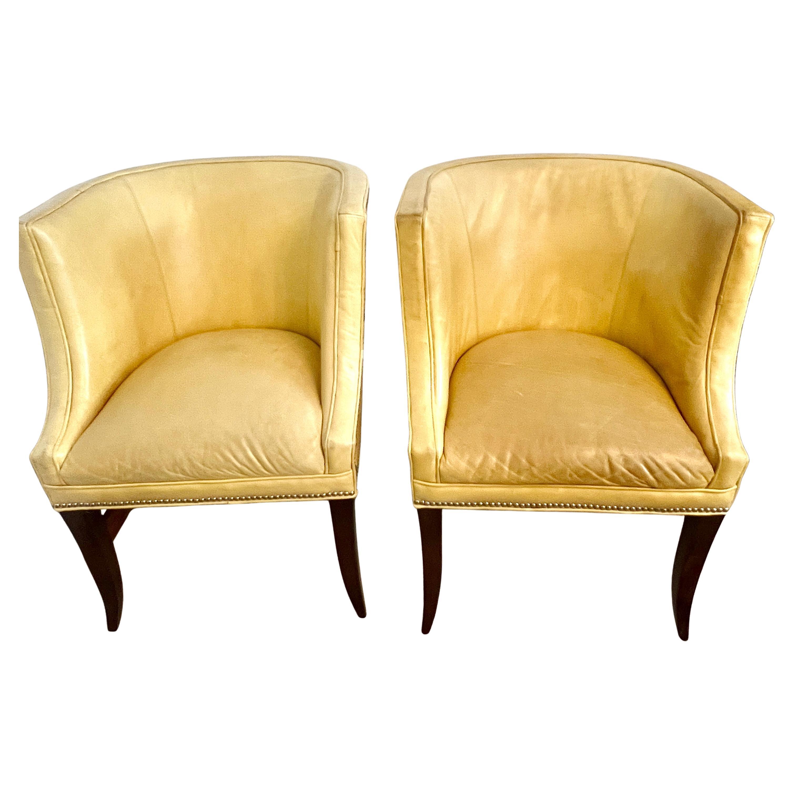 Pair of Patinated Yellow Leather Club Barrel Style Chairs with Nailheads For Sale