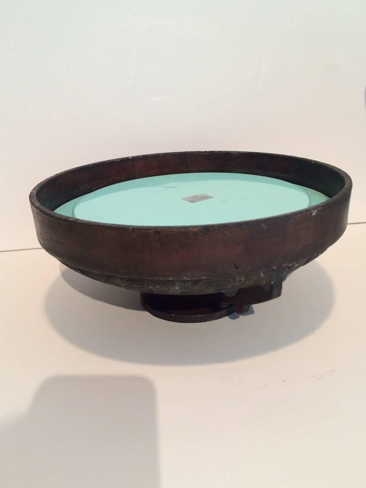 This is a beautiful and substantial ice bucket in the spirit of James Mont. In great shape and ready to be the mixer to your special function.  Turquoise plastic insert with insulation and metallic surround - in the style of a Chinese Cauldron 