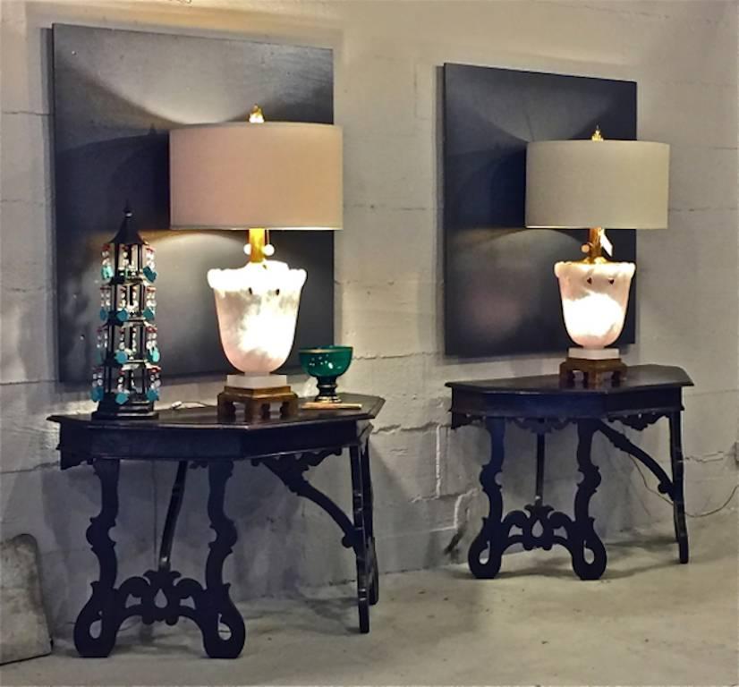 This is an outstanding pair of very large carved Alabaster lamps was created by the renown Marbro lamp company in the 1960s. These lamps exemplify Marbro's attention to detail: the alabaster is of the highest quality; the urns are finely carved with
