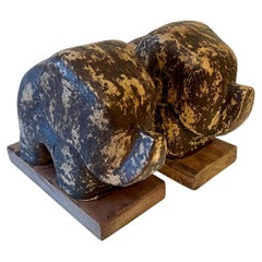 Pair of Heavily Patinated Hand-Carved Elephant Bookends