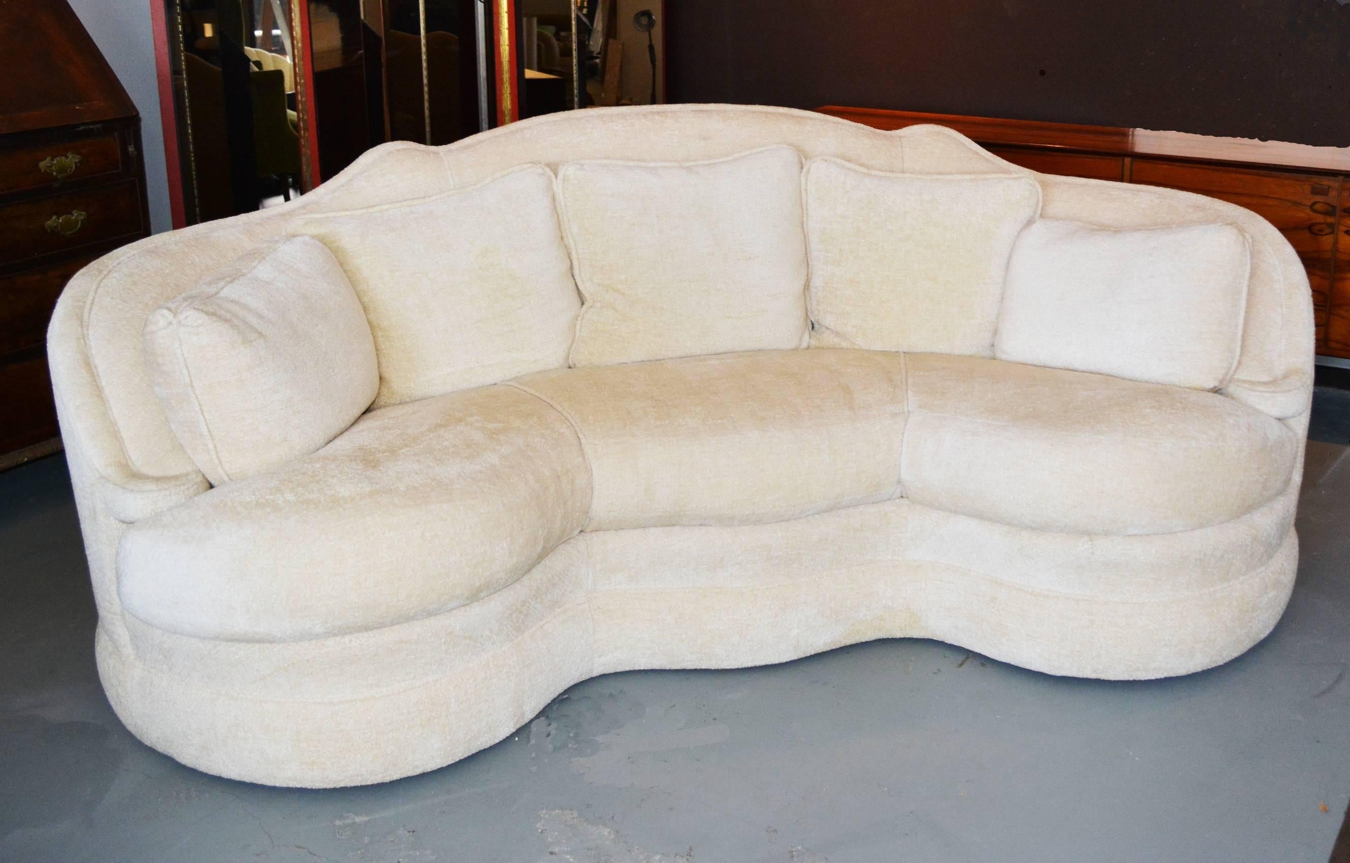 A vintage Michael Taylor Schiaparelli sofa in an ivory chenille.