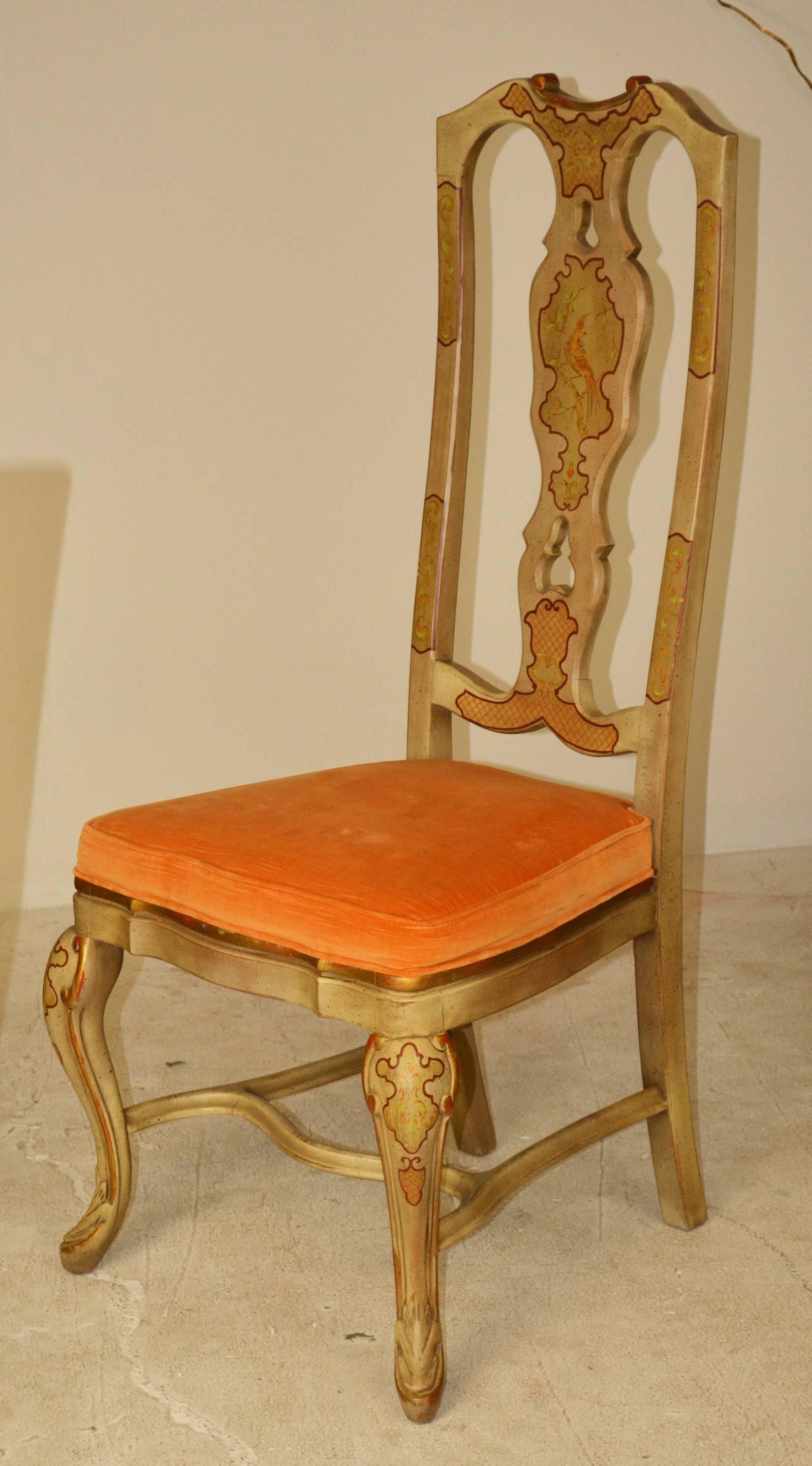 Very Palm Beach! A great set of Queen Anne style dining chairs with painted Chinoiserie decoration. Beautiful carved cabriole legs and curved stretchers. Priced as a set of six, with an additional set of four available separately.