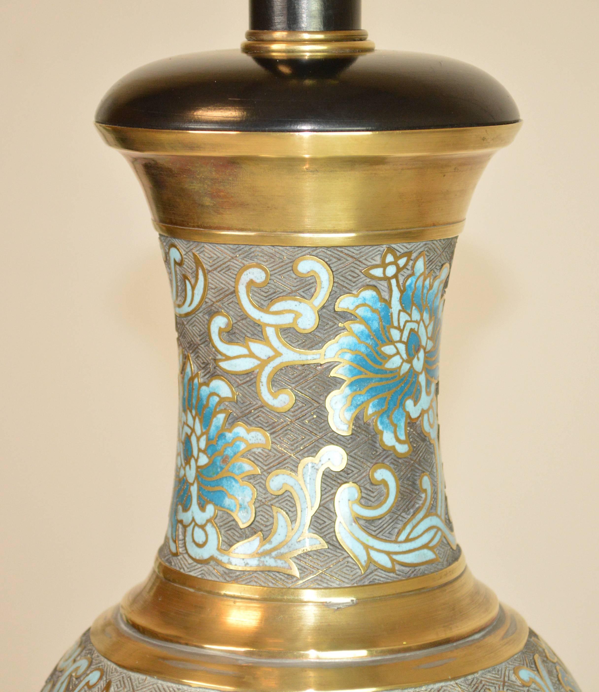 A large cloisonné lamp in shades of blue retailed by Marbro. Quite fantastic. Shade for display only.