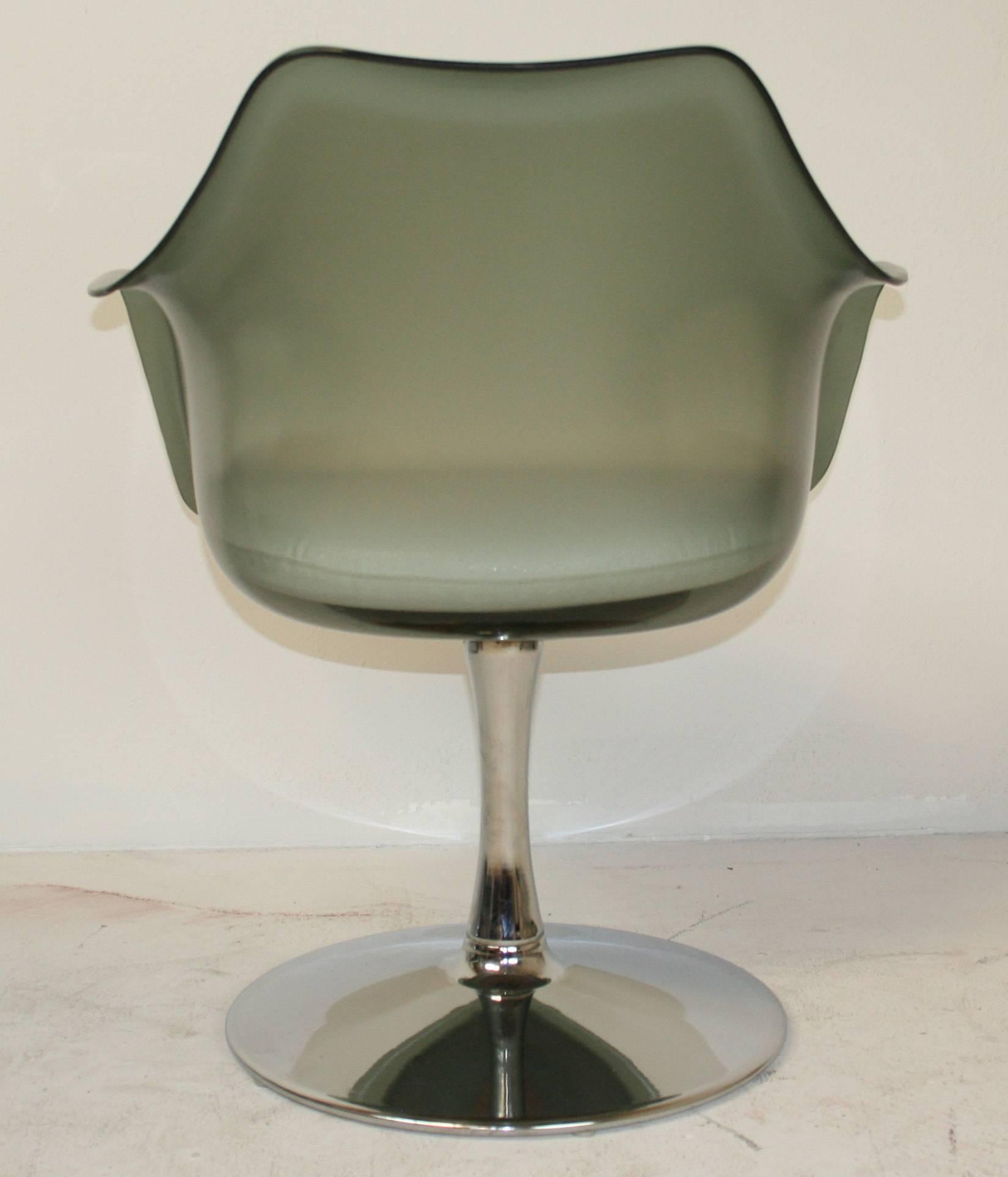 A pair of Tulip chairs in smoked Lucite on chrome bases with newly upholstered seat cushions. Lucite has no cracks and is in very good condition.