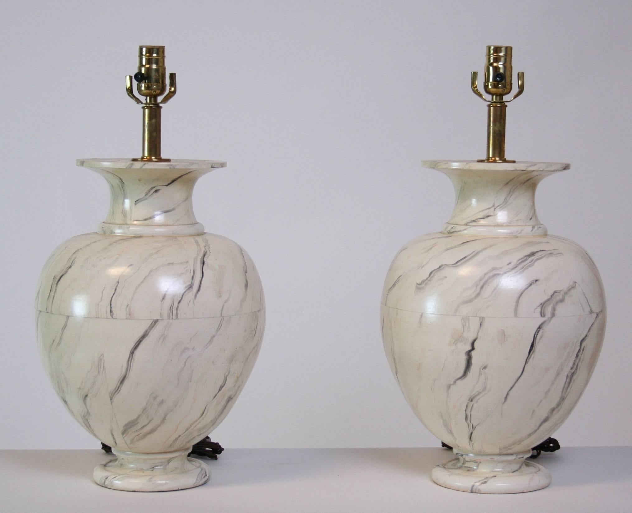 A lovely pair of Mid-Century Modern ceramic table lamps by Jean Roger in the shape of a classical urn with faux marble glaze, French, circa 1970. Shades for display only, height to top of socket 21