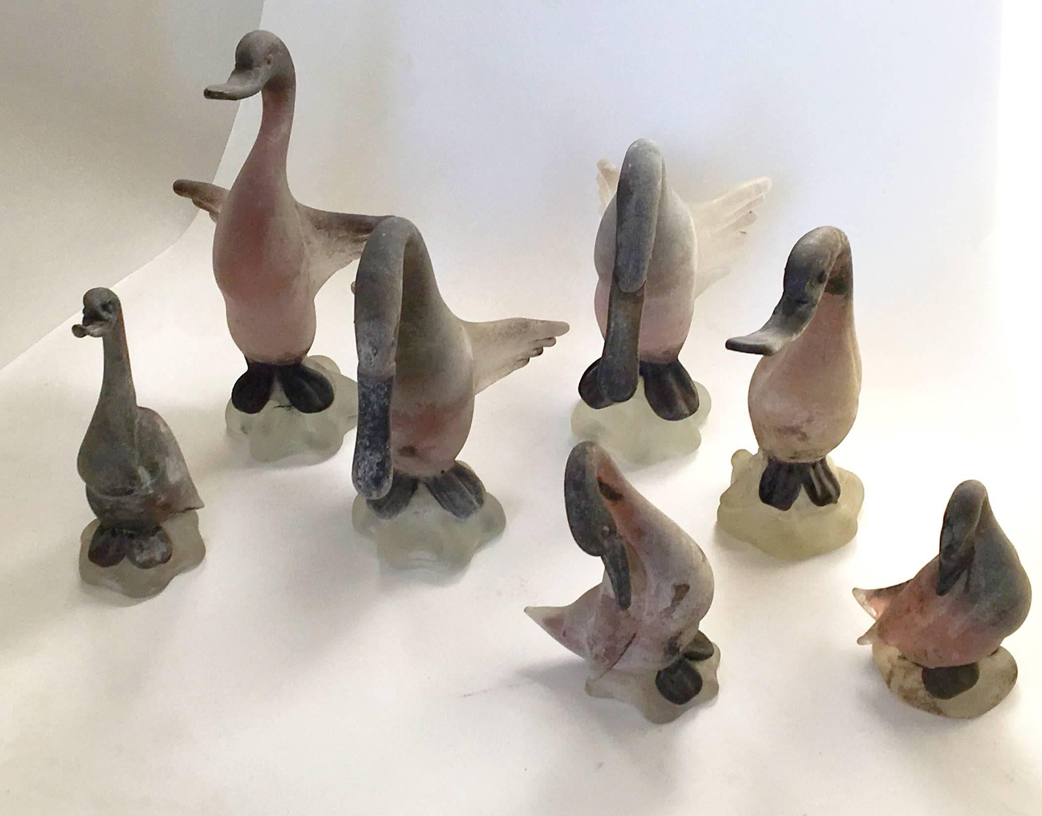 An assembled collection of seven birds (swans, ducks, geese, your call) by Antonio da Ros for Cenedese in the scavo technique. Four large birds, two small birds and one medium. The larger pieces are signed 'Cenedese' and two of the smaller pieces