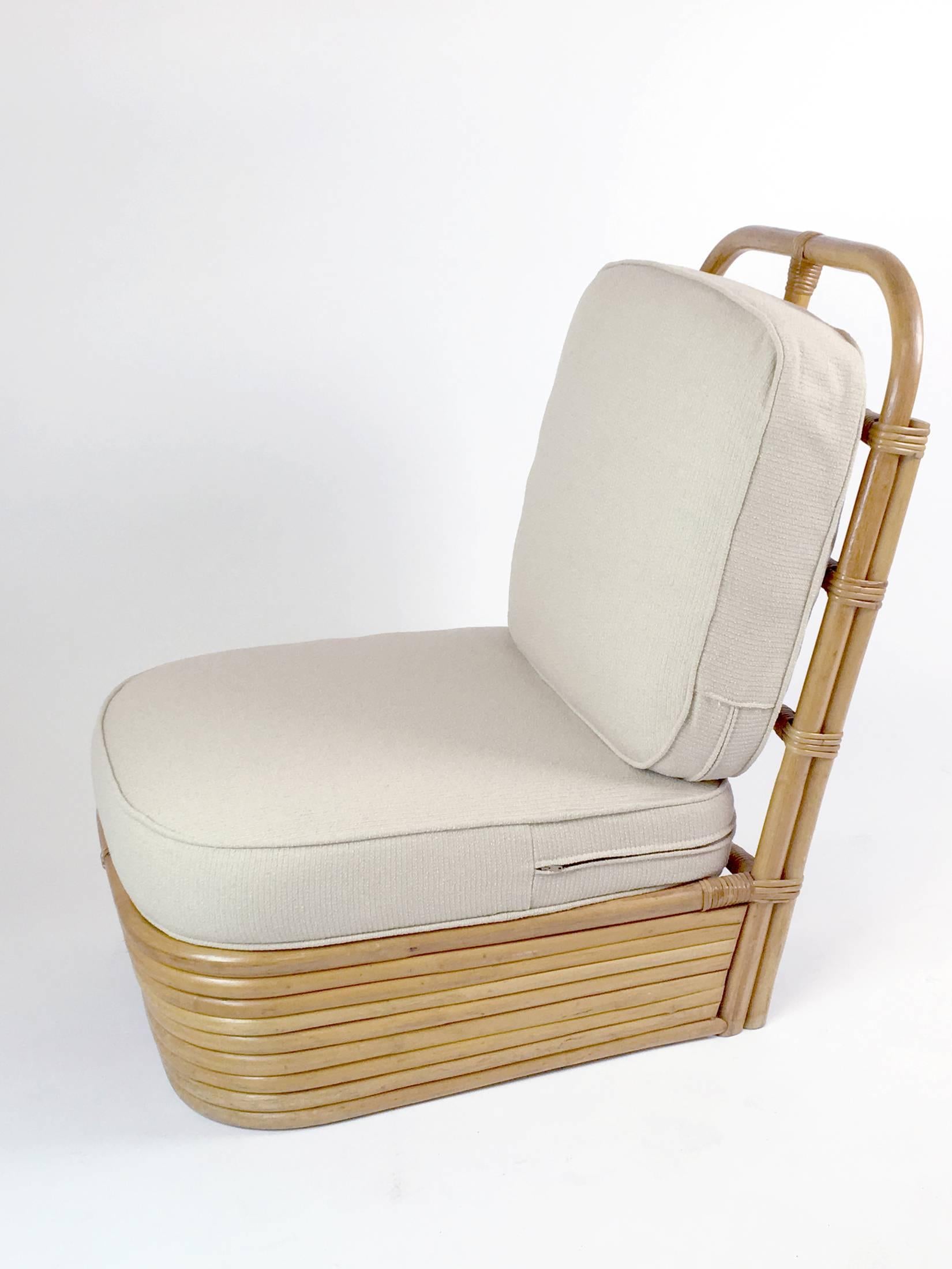 A pair of Paul Frankl style slipper chairs by Tochiku Industries in Japan, circa 1950. New cushions in off-white linen. Art Deco / Mid-Century Modern style.
           