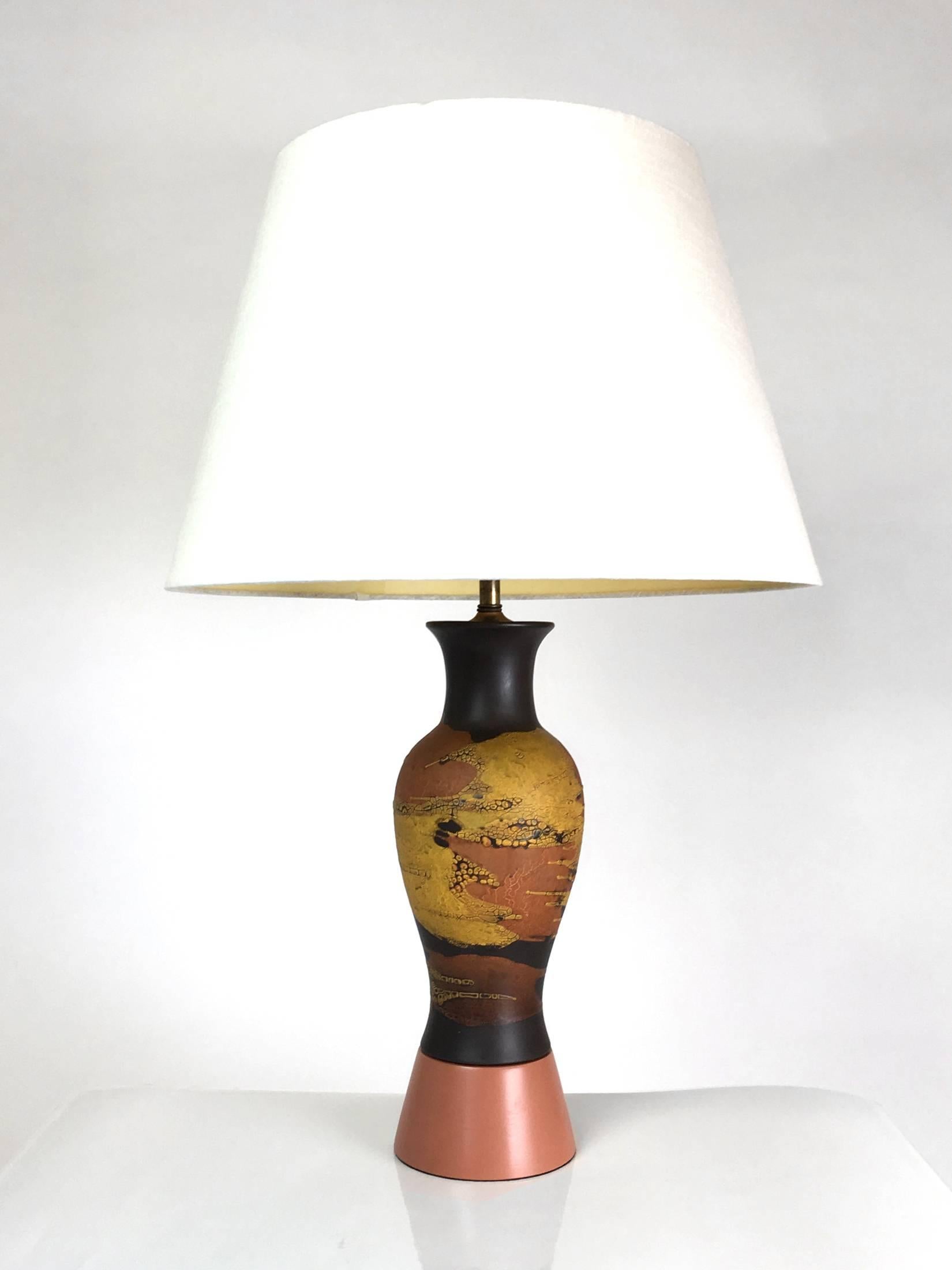A pair of lamps created from 1970s pottery vases by Royal Haeger's 