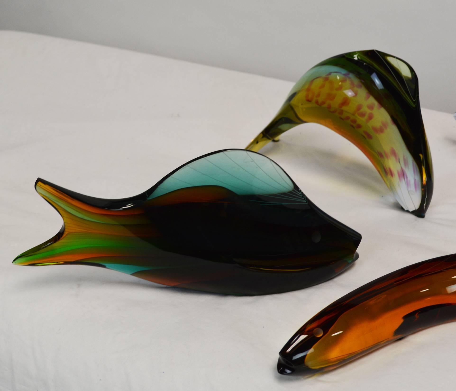 A group of six Czech glass fish by Exbor .
“...The concept for this range was devised in 1958, when Rozinek and Honzik saw fish sculptures created by Vera Liskova for Moser that were to be included in the World Exposition in Brussels. Rozinek, a