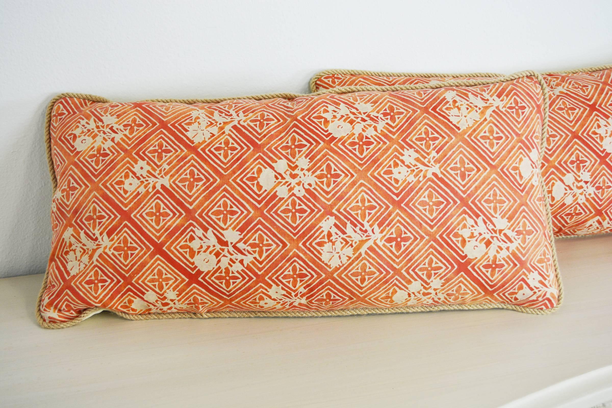A pair of pillows newly made from vintage Fortuny 