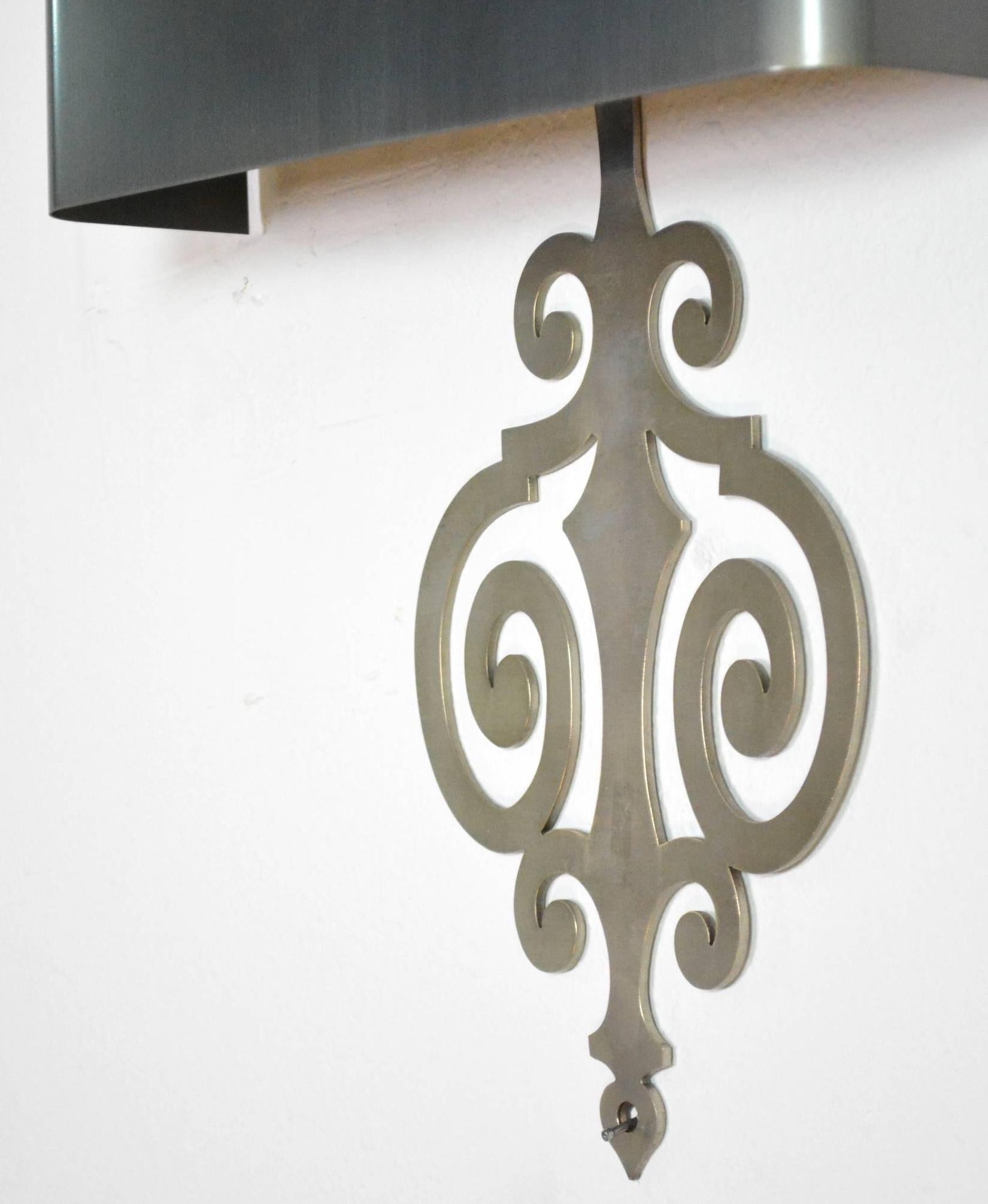 Pair of Maison Charles Steel Sconces In Good Condition For Sale In Palm Springs, CA